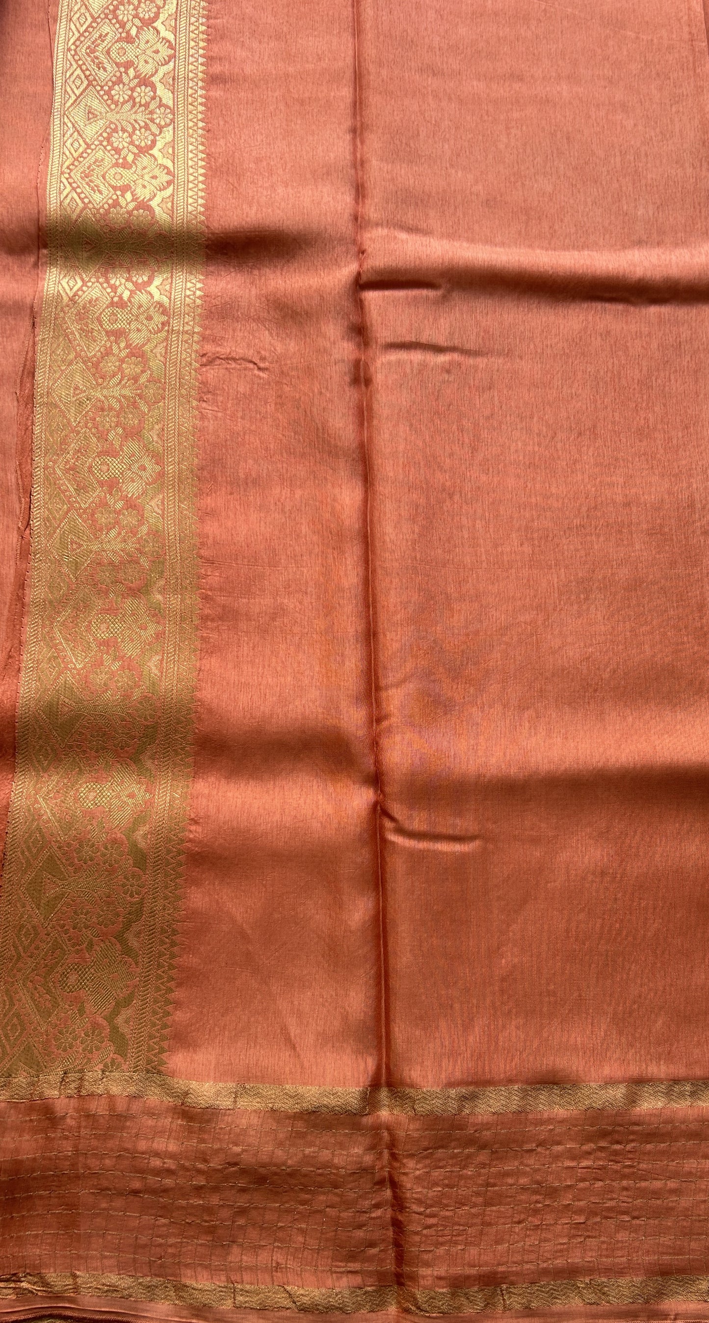 Satin Georgette Saree Pale Orange Colored Elegantly Paired with a Zari Border. - Sampradaya Designer Studio