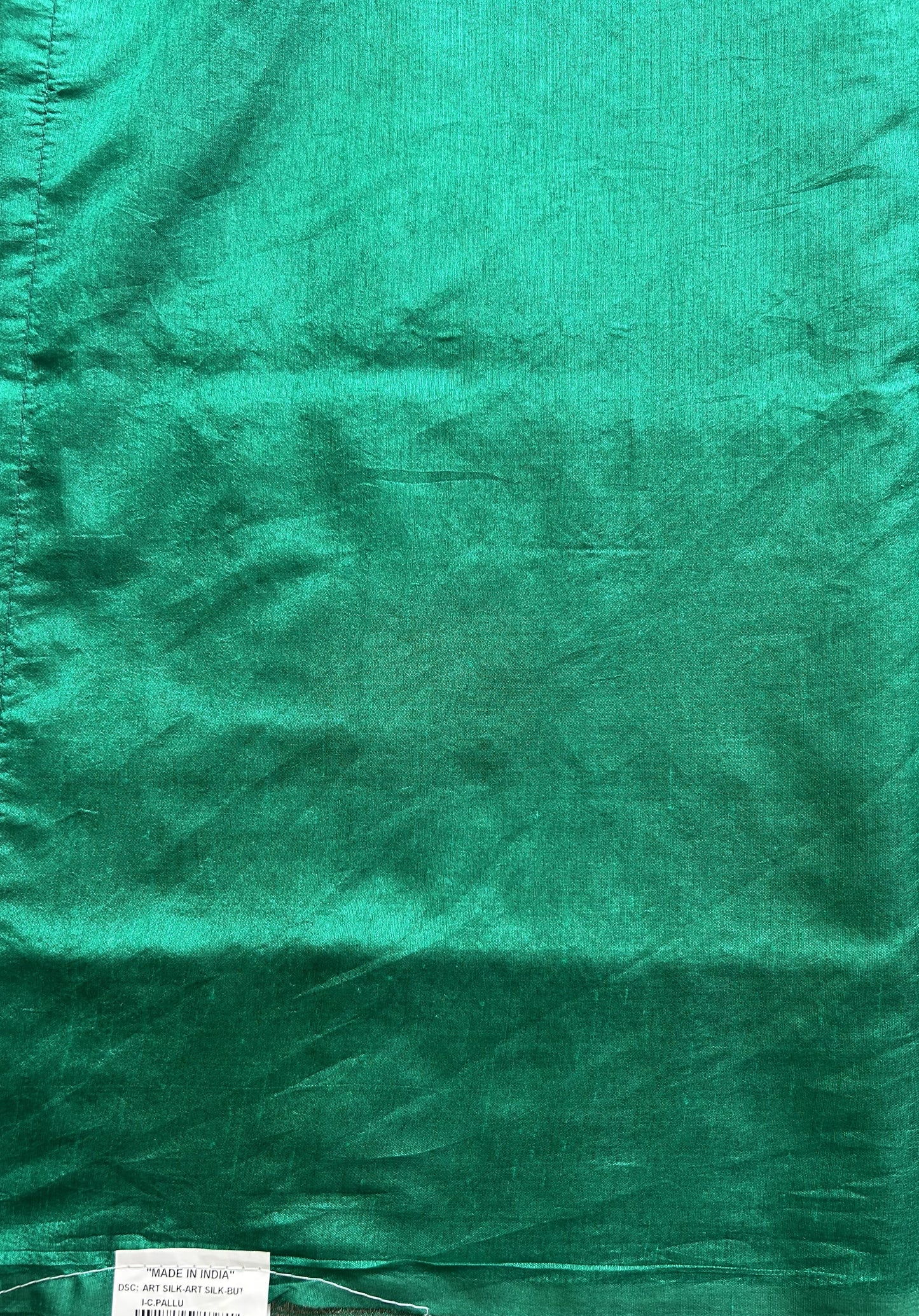 Semi Raw Silk Saree Rama Green Colored Elegantly paired with a Silver Zari Border. - Sampradaya Designer Studio