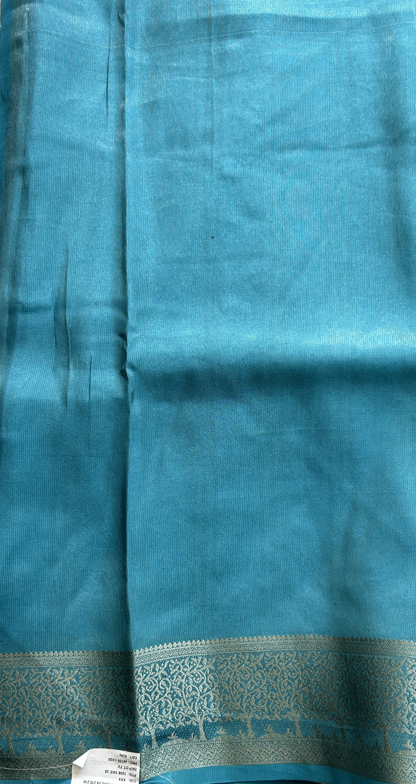Semi Raw Silk Saree Teal Blue Colored Complemented with a Zari Border. - Sampradaya Designer Studio
