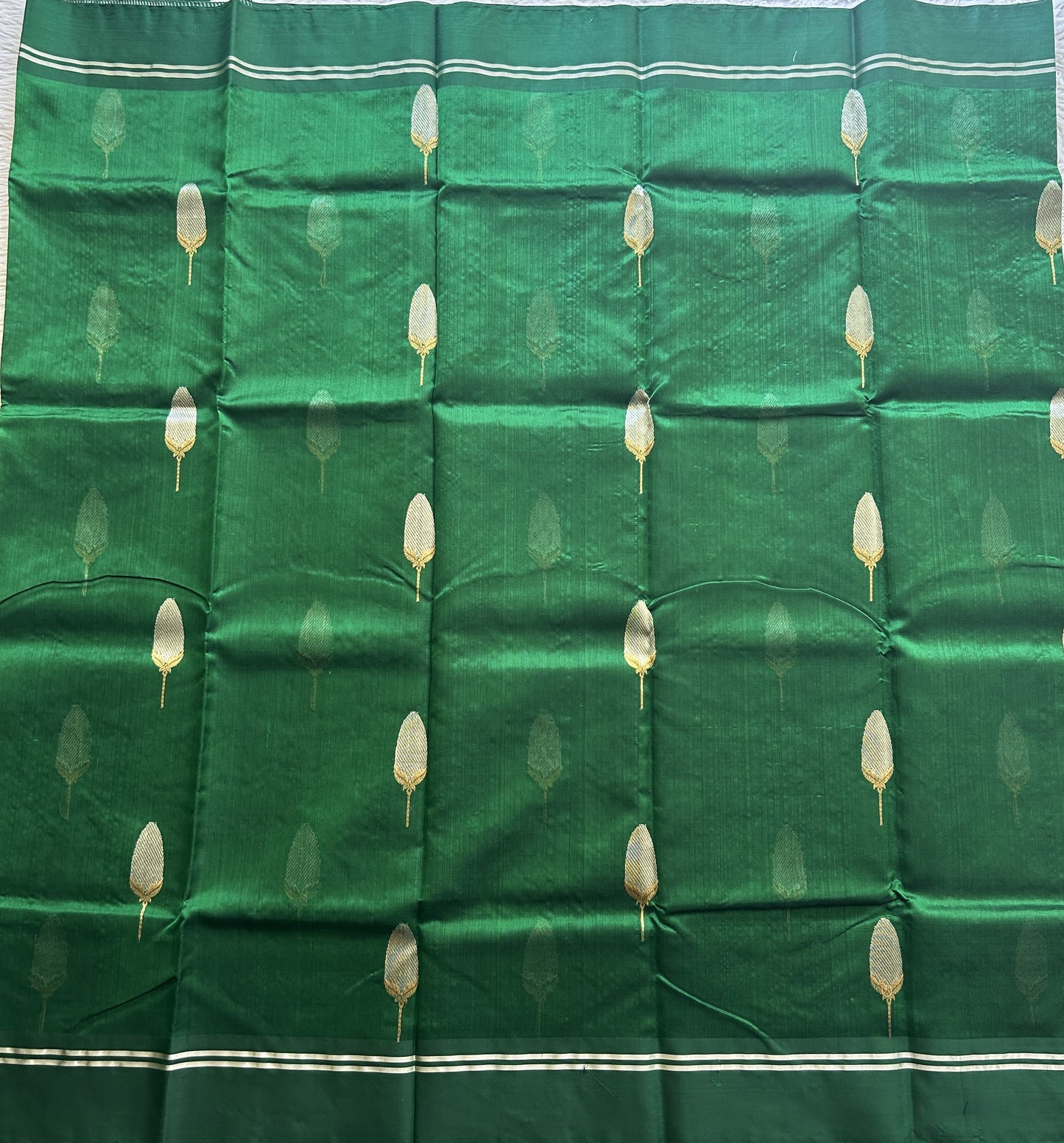 Chanderi Silk Saree Bottle green color Elegantly Paired with a Silver Zari border - Sampradaya Designer Studio