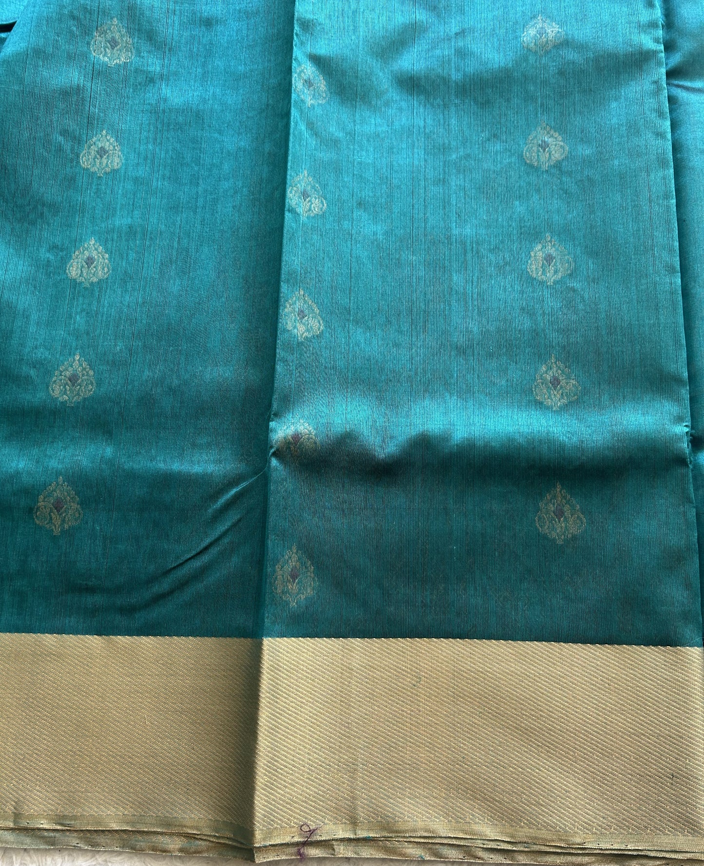 Chanderi Silk Rama Blue color Elegantly Paired with a Gold Zari border - Sampradaya Designer Studio