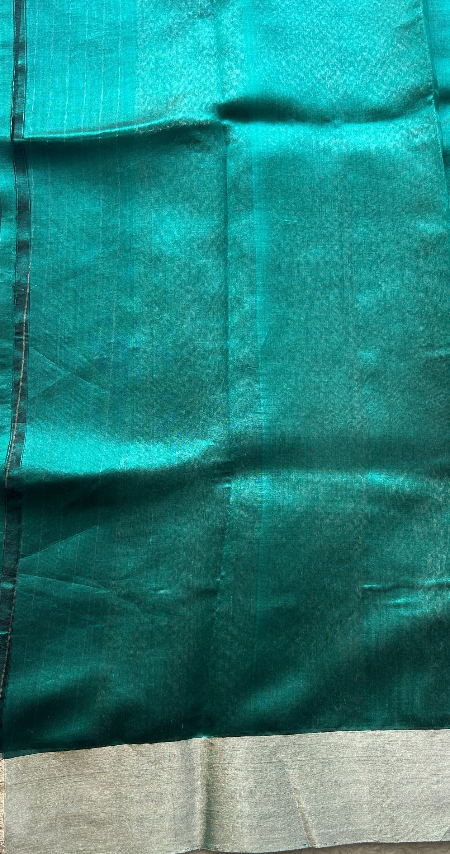 Chanderi Silk Saree Peacock Green color Elegantly Paired with a Zari border - Sampradaya Designer Studio