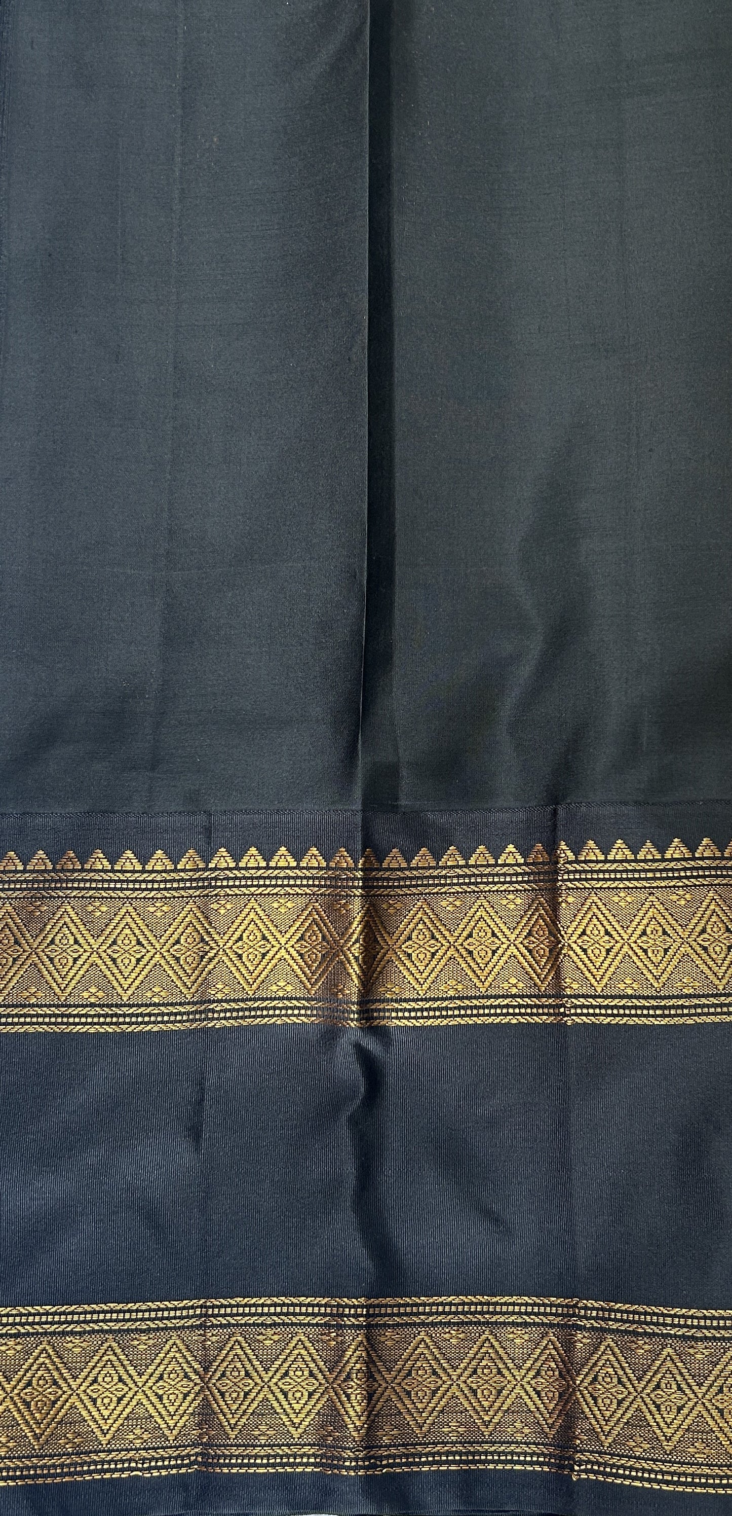 Gadwal Pattu Saree Mustard Yellow colored saree complemented with a Black Kanchi Gap Border - Sampradaya Designer Studio