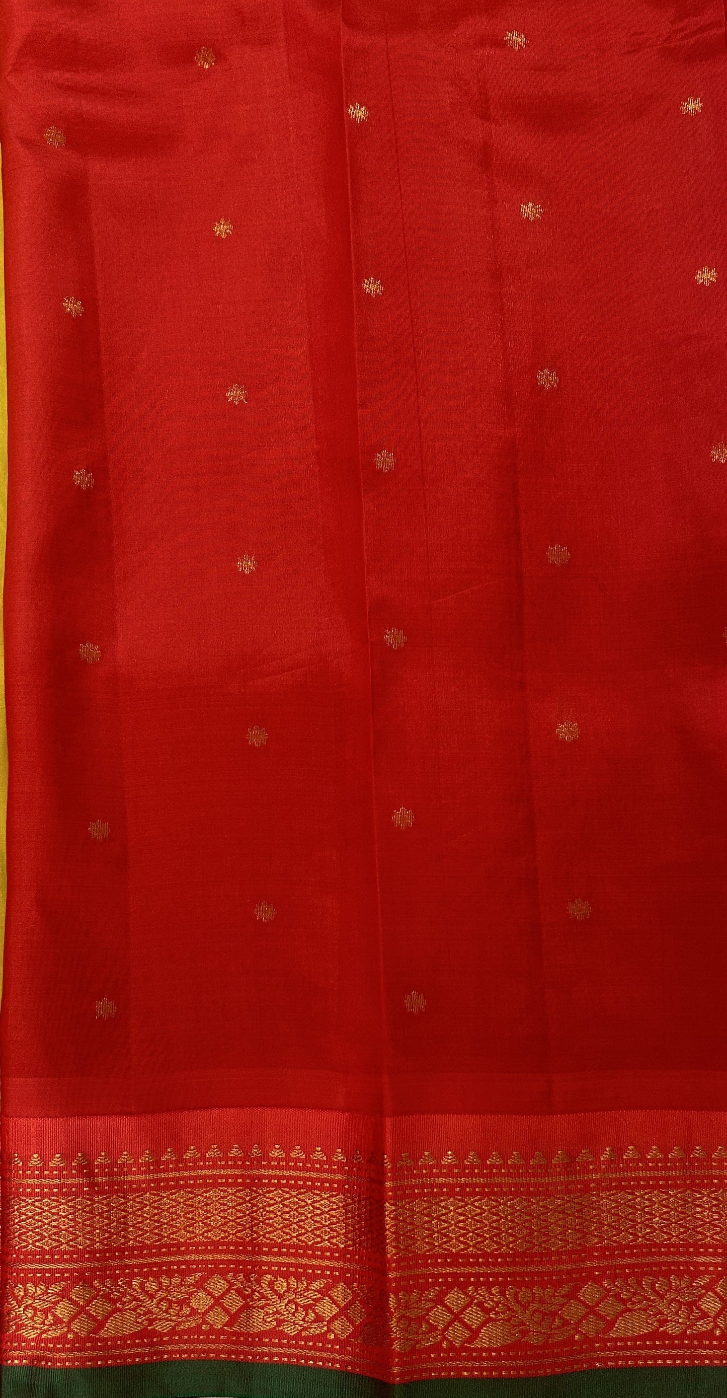 Gadwal Pattu Saree Yellow colored saree complemented with a Red Kanchi Border - Sampradaya Designer Studio