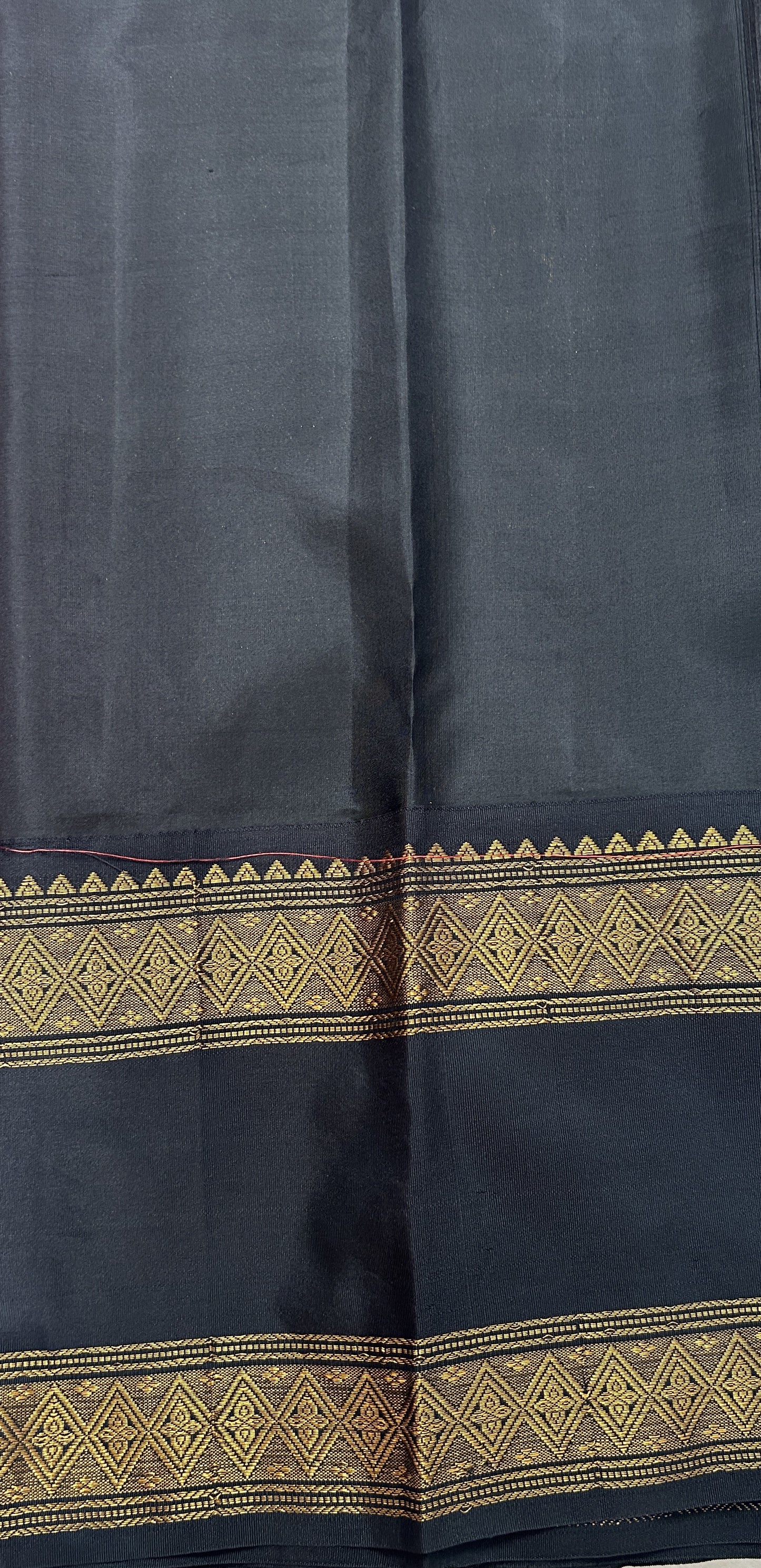Gadwal Pattu Saree Pink colored saree complemented with a Black Kanchi Border - Sampradaya Designer Studio