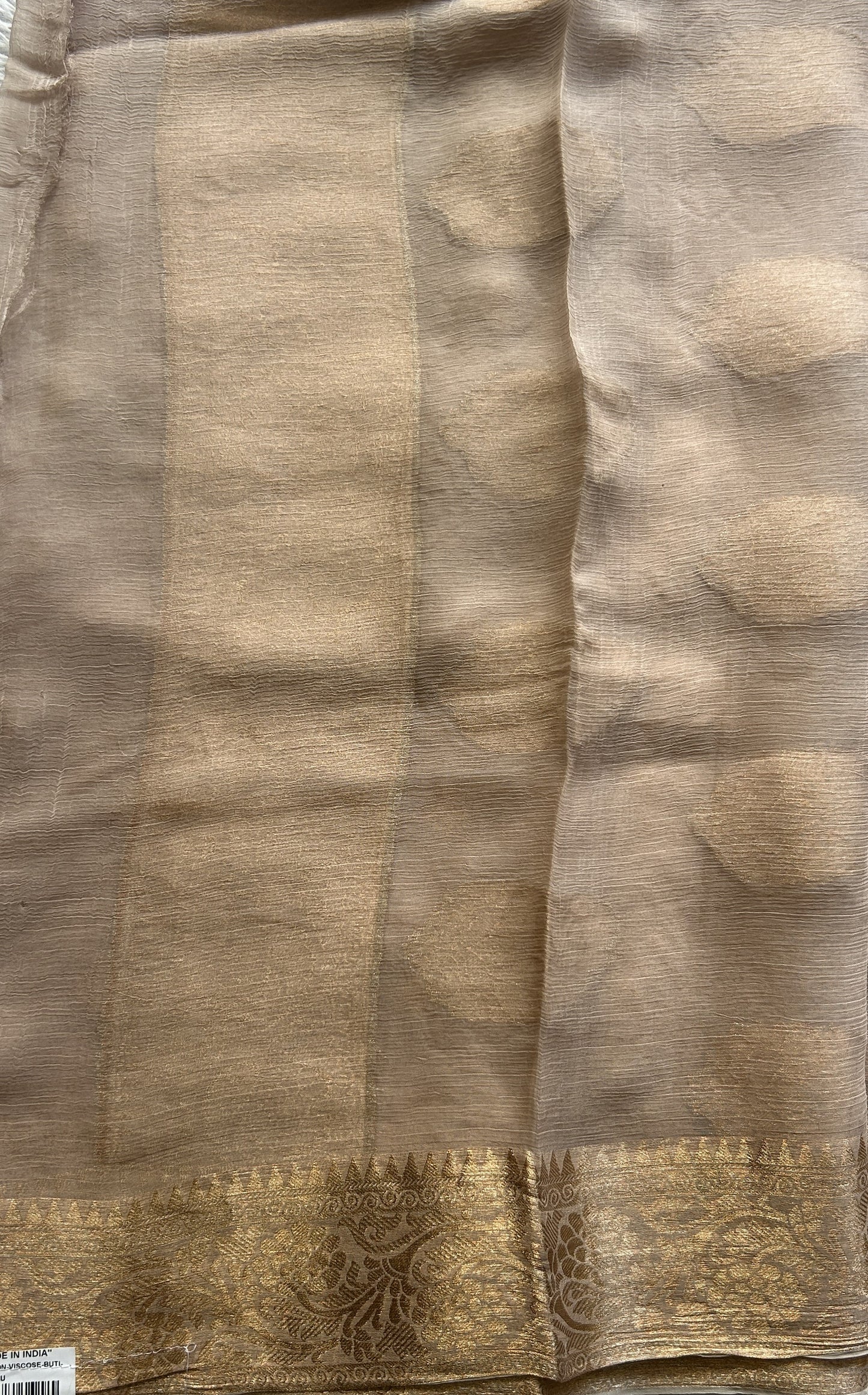 Semi Georgette Saree Oat Colored Elegantly Paired with a Zari Border. - Sampradaya Designer Studio