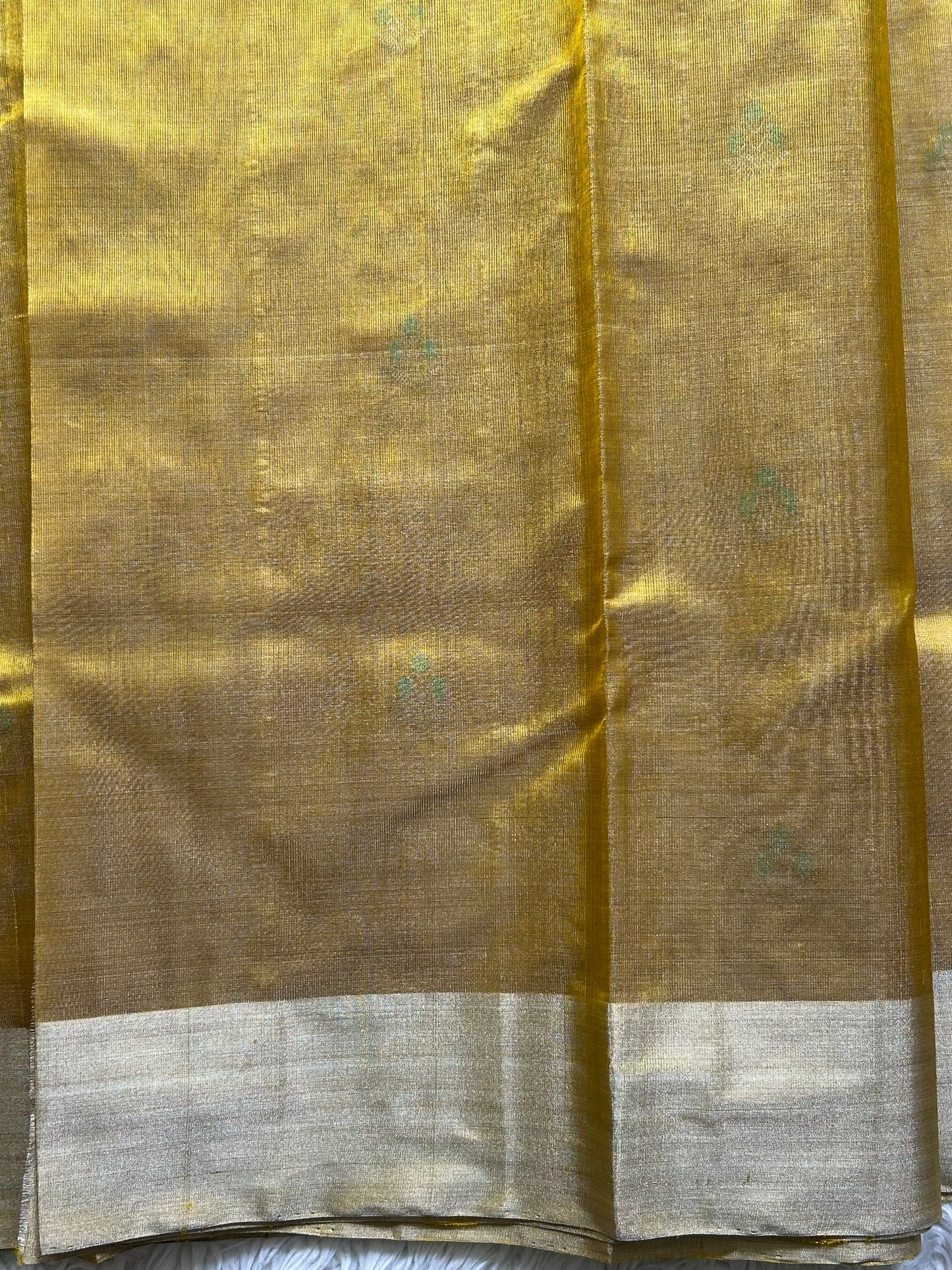 Chanderi Tissue Saree Amber color Elegantly Paired with a Silver Zari Border - Sampradaya Designer Studio
