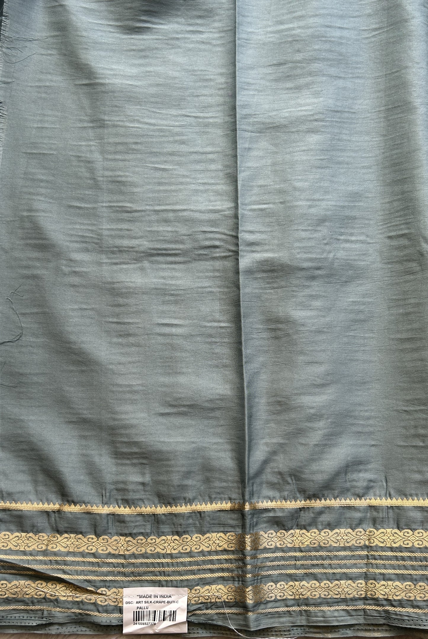 Semi Georgette Saree Elephant Gray Colored elegantly adorned with a Zari Border. - Sampradaya Designer Studio