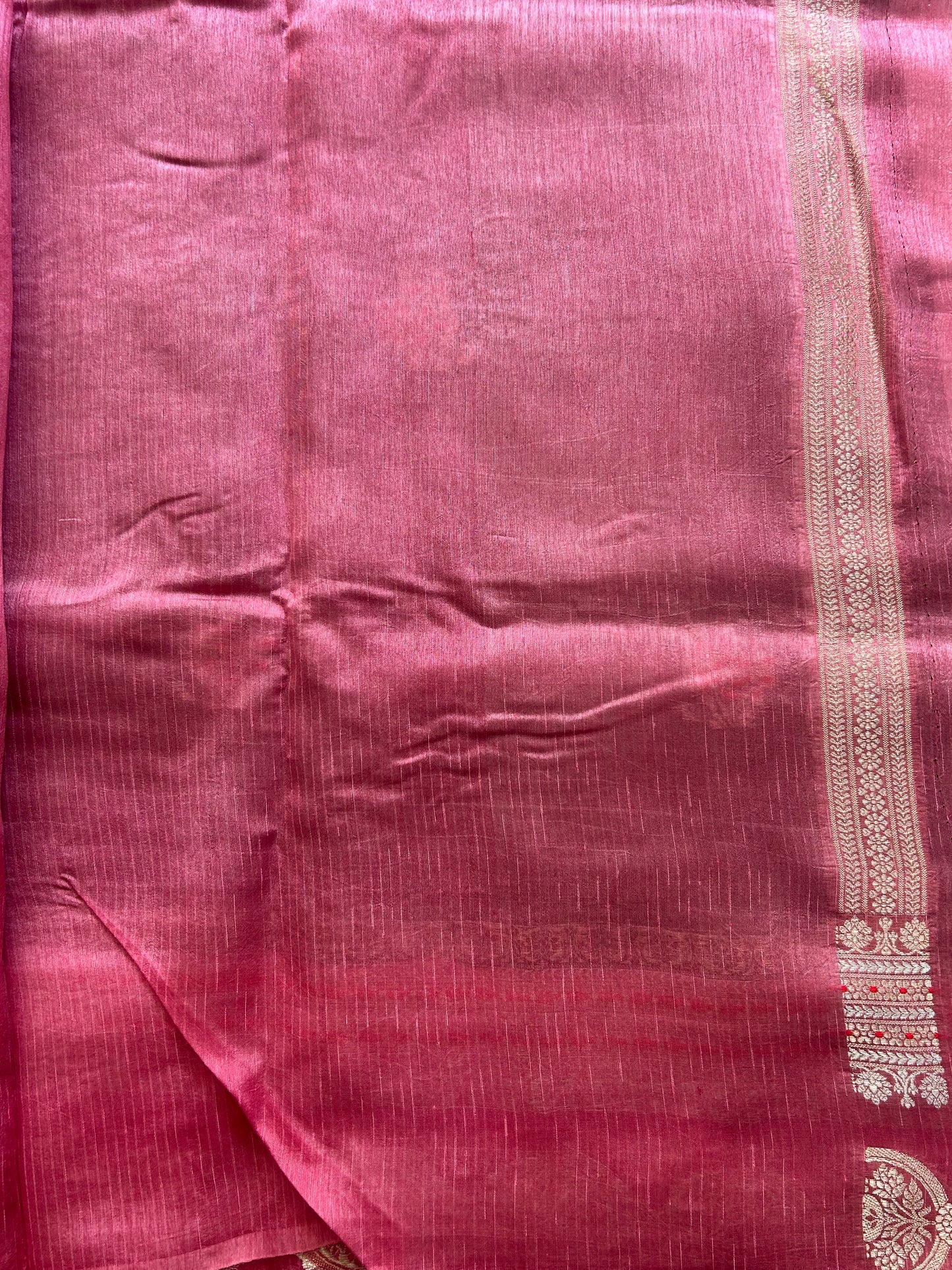 Banarasi Fancy Saree Violet Colored Complemented with a Silver Zari Border.