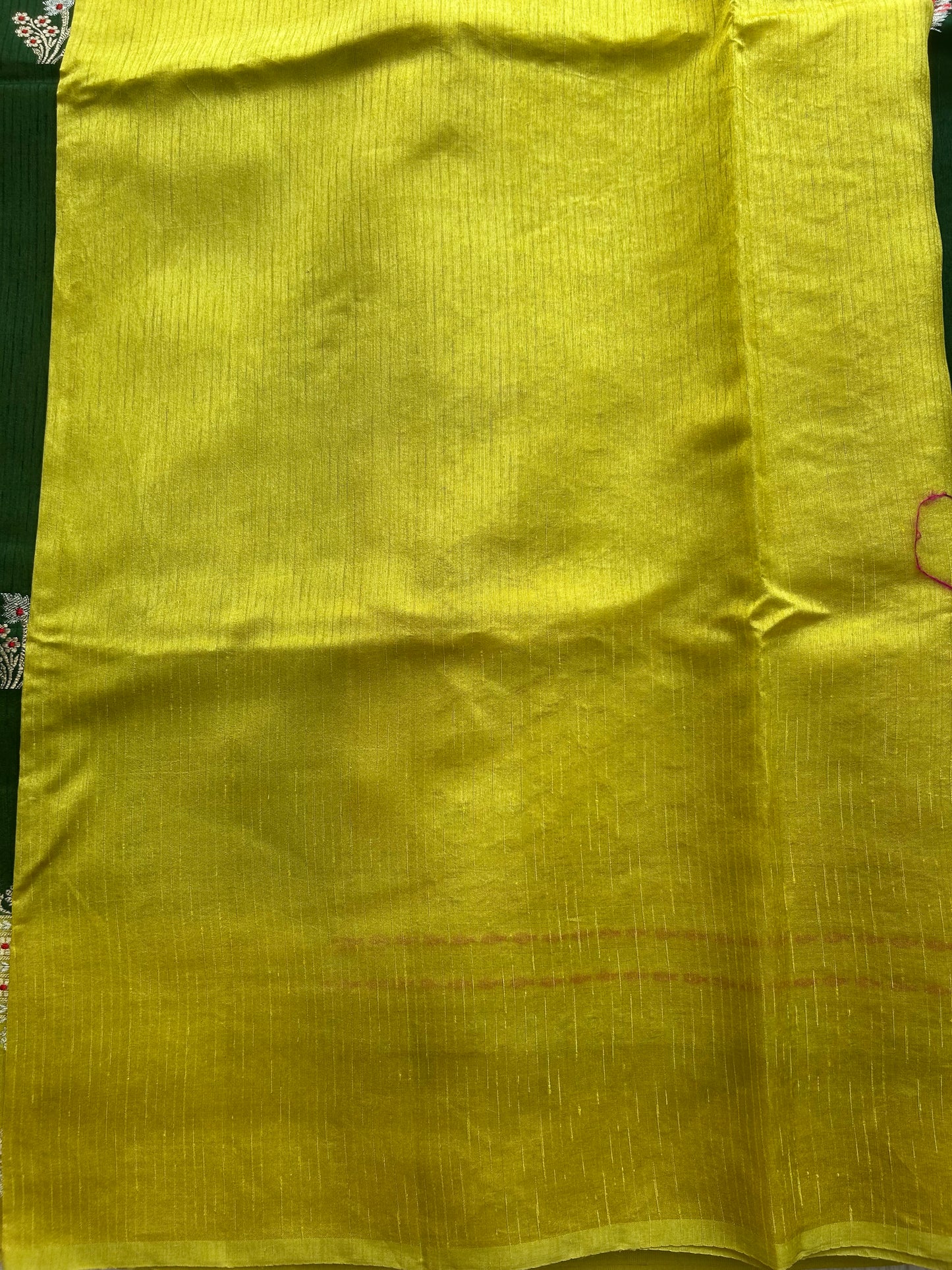 Banarasi Fancy Saree Jungle Green Colored Complemented with a Gold Zari Border.