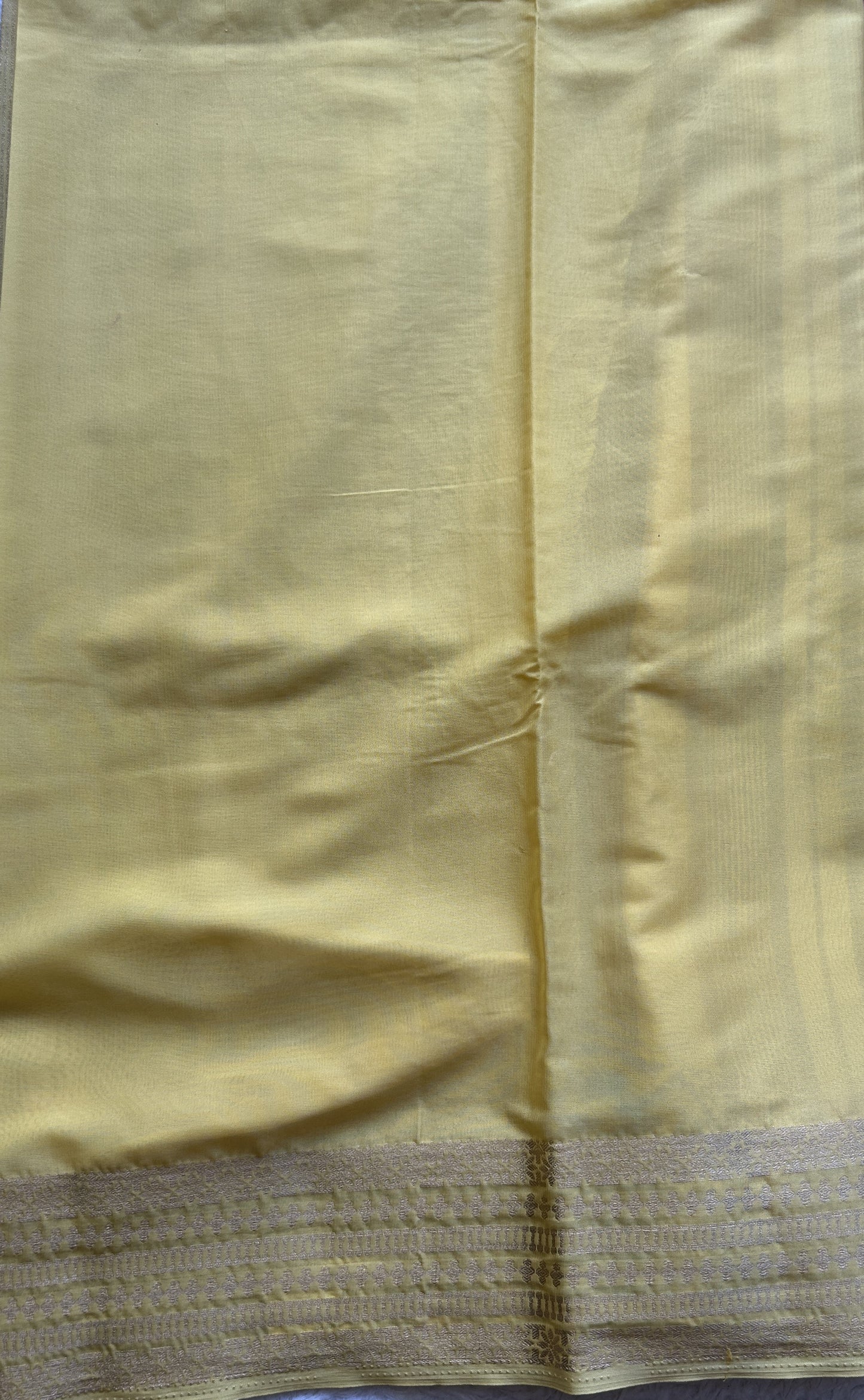 Semi Georgette Saree Maroon Colored Complemented with a Light Yellow Color Zari Border. - Sampradaya Designer Studio
