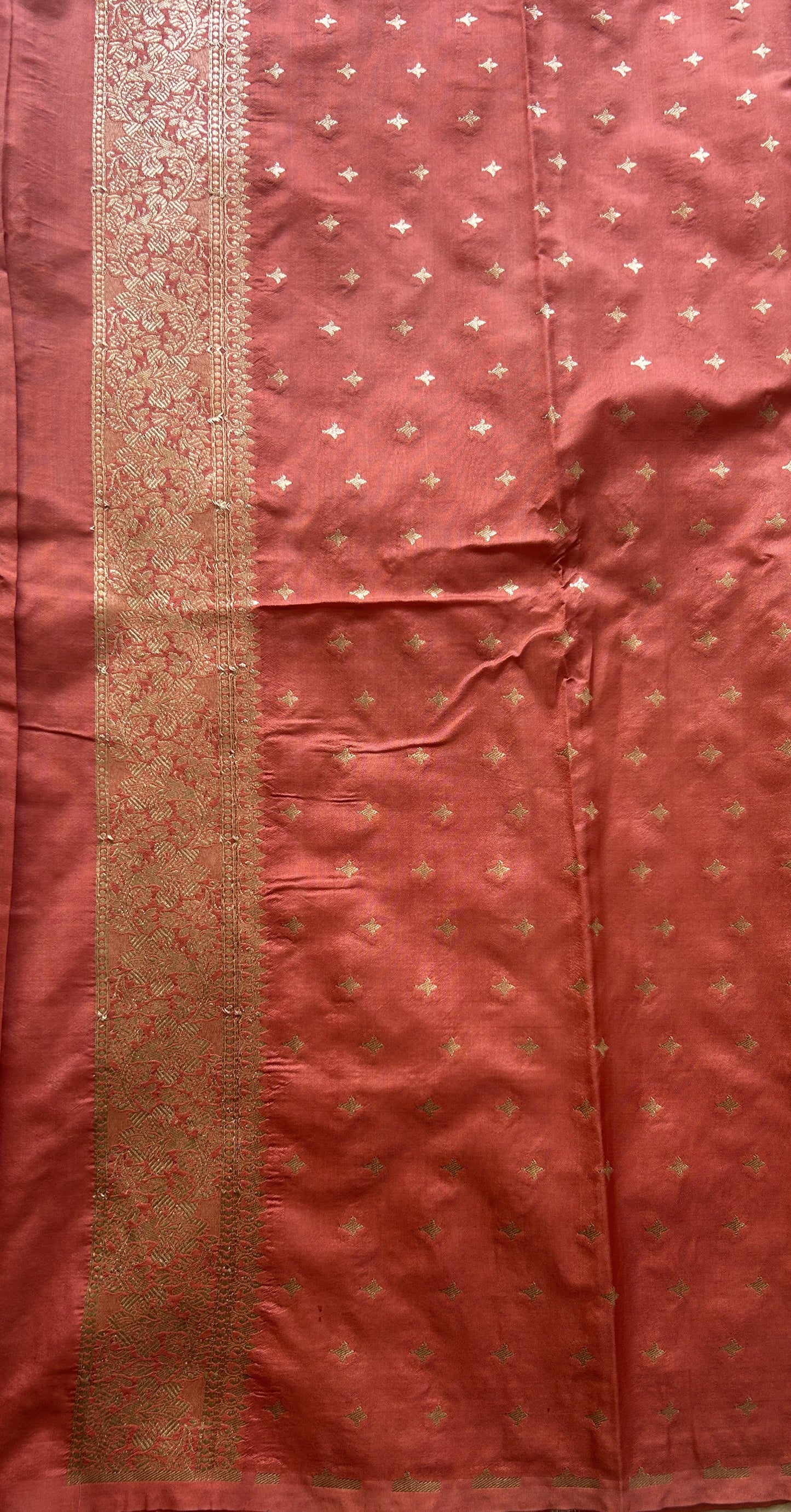 Semi Raw Silk Saree Peach Colored Elegantly Paired with a Buti Border. - Sampradaya Designer Studio