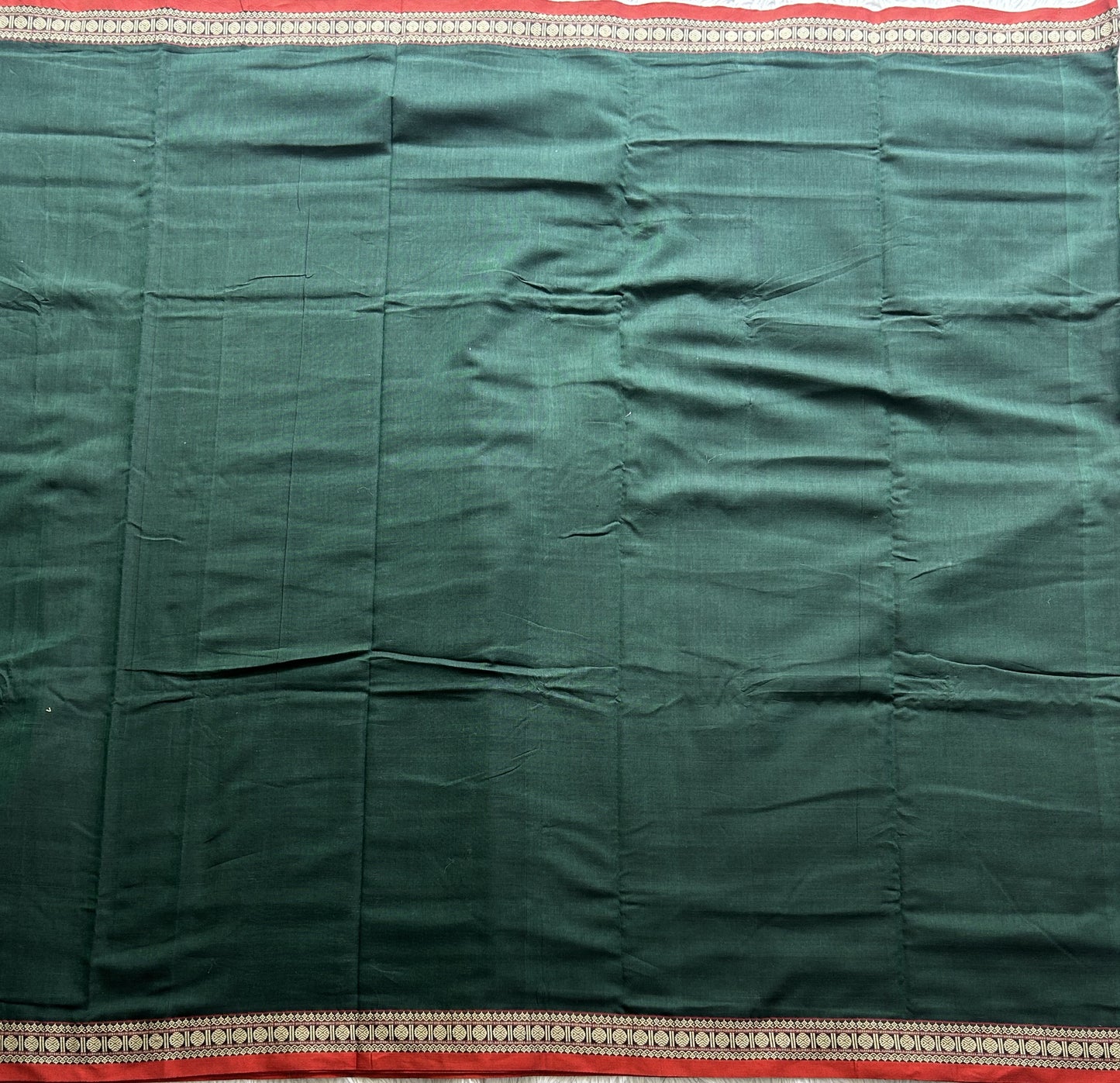 Narayanpet Cotton Saree Sacramento Green Colored Complemented with a Thread Border.