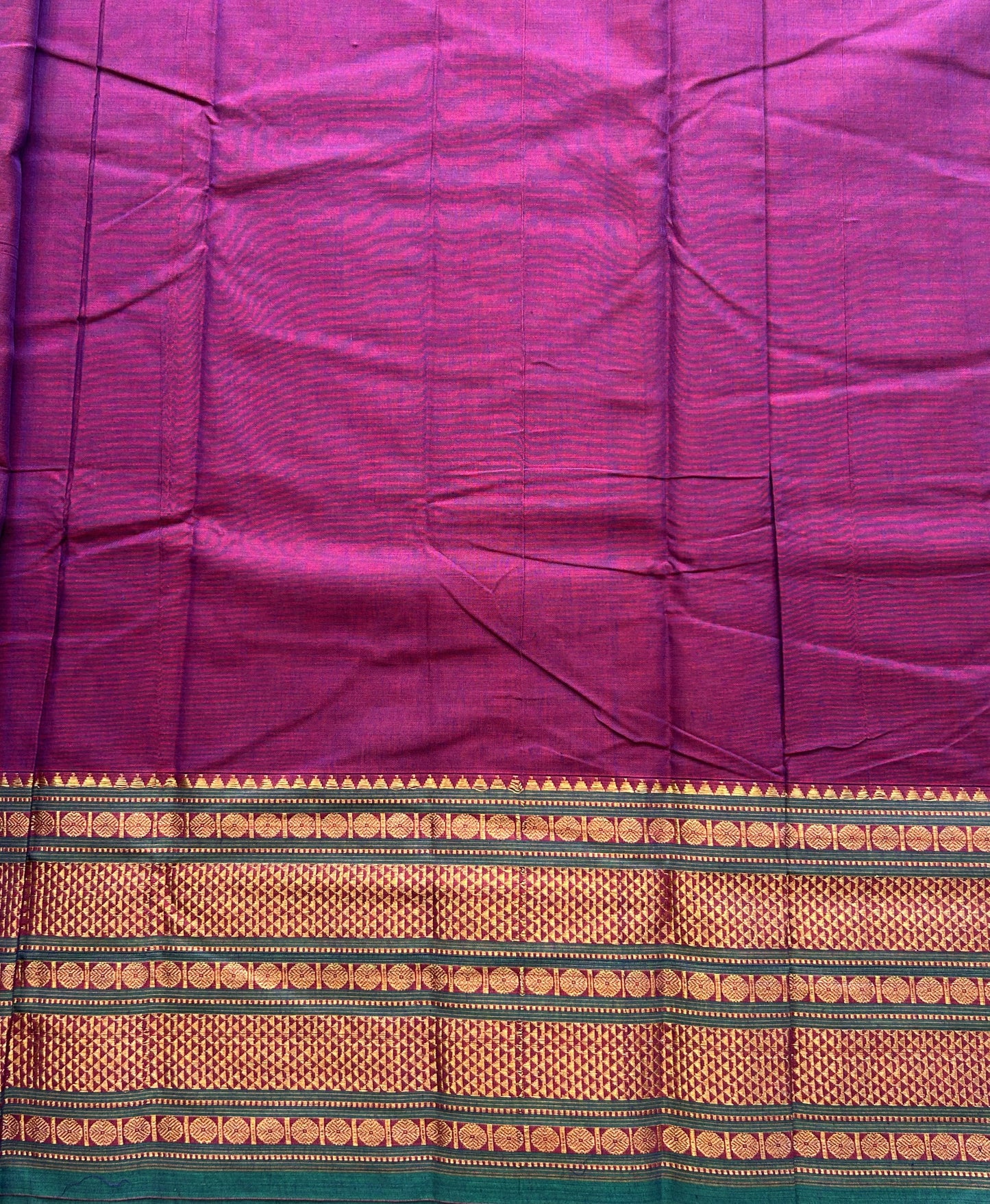 Narayanpet Cotton Saree Byzantine Colored Complemented with a Gold Zari Border.