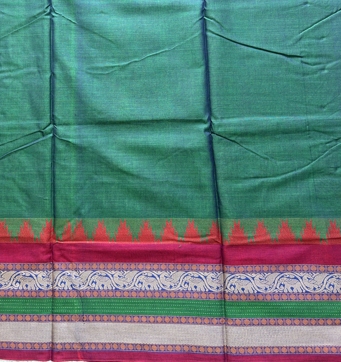 Narayanpet Cotton Saree Light Basil Green Colored Complemented with a Thread Border.
