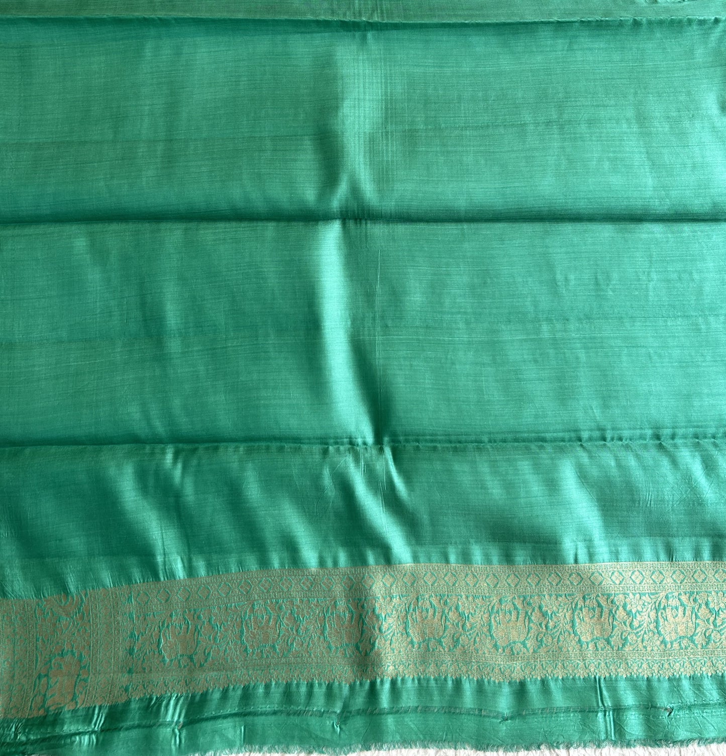 Pure Chiniya Silk Saree Jungle Colored Elegantly Paired with a Silver Zari Border. - Sampradaya Designer Studio