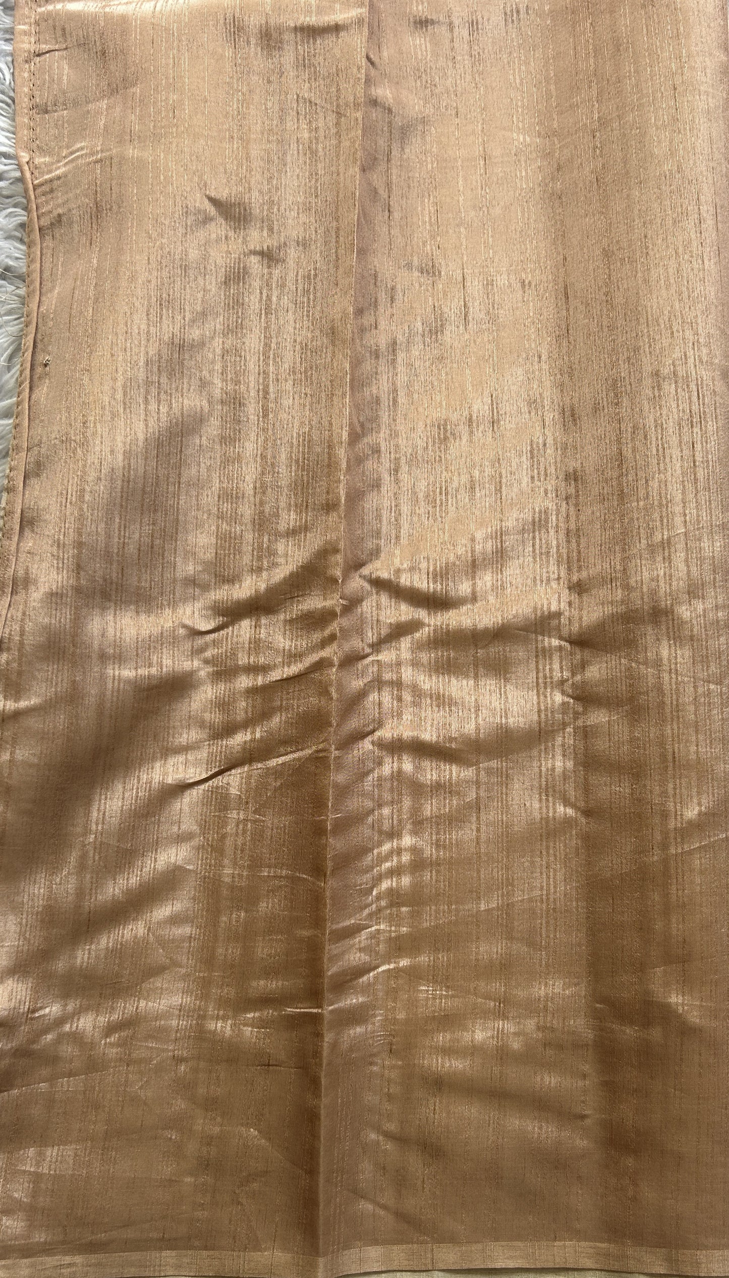 Semi Tussar Saree Light Orange Colored Elegantly Paired with a Borderless. - Sampradaya Designer Studio