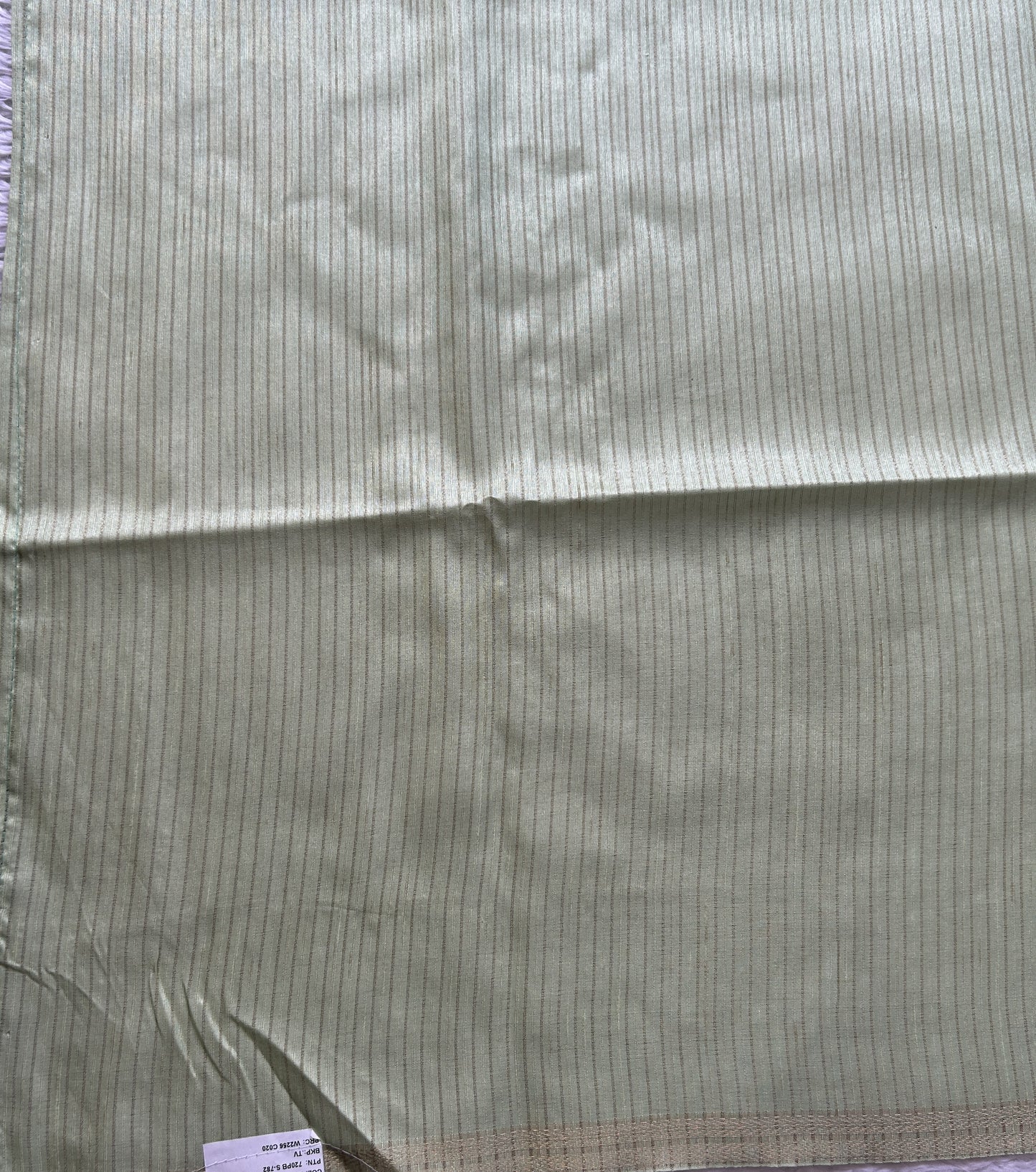 Semi Tussar Saree Colored Light Green Complemented with a Zari Border. - Sampradaya Designer Studio