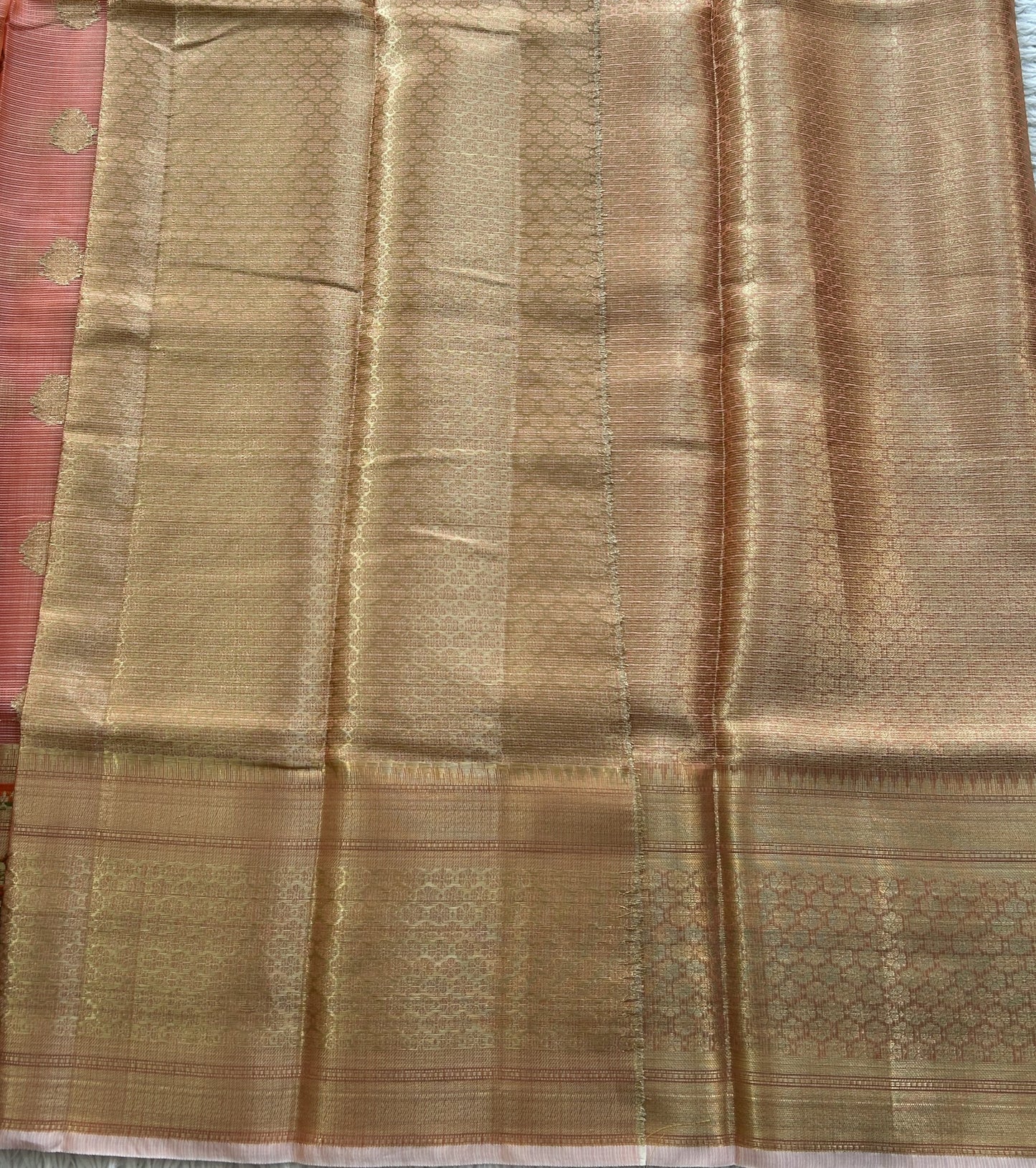 Tissue Kota Saree Dark Peach Colored Elegantly Paired with a Tissue Border