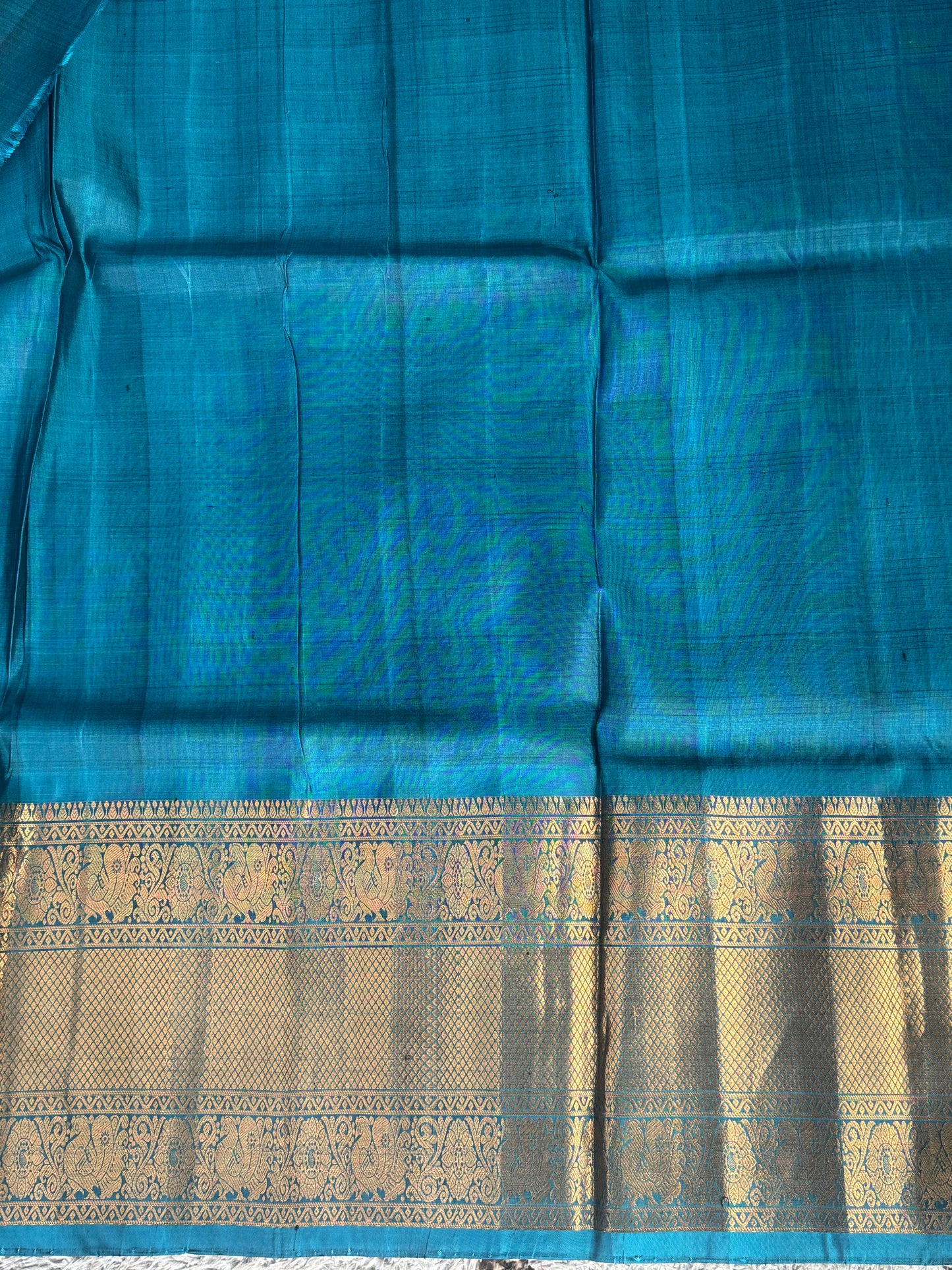 Gadwal Silk Saree Electric Colored Complemented With Gold Zari Border