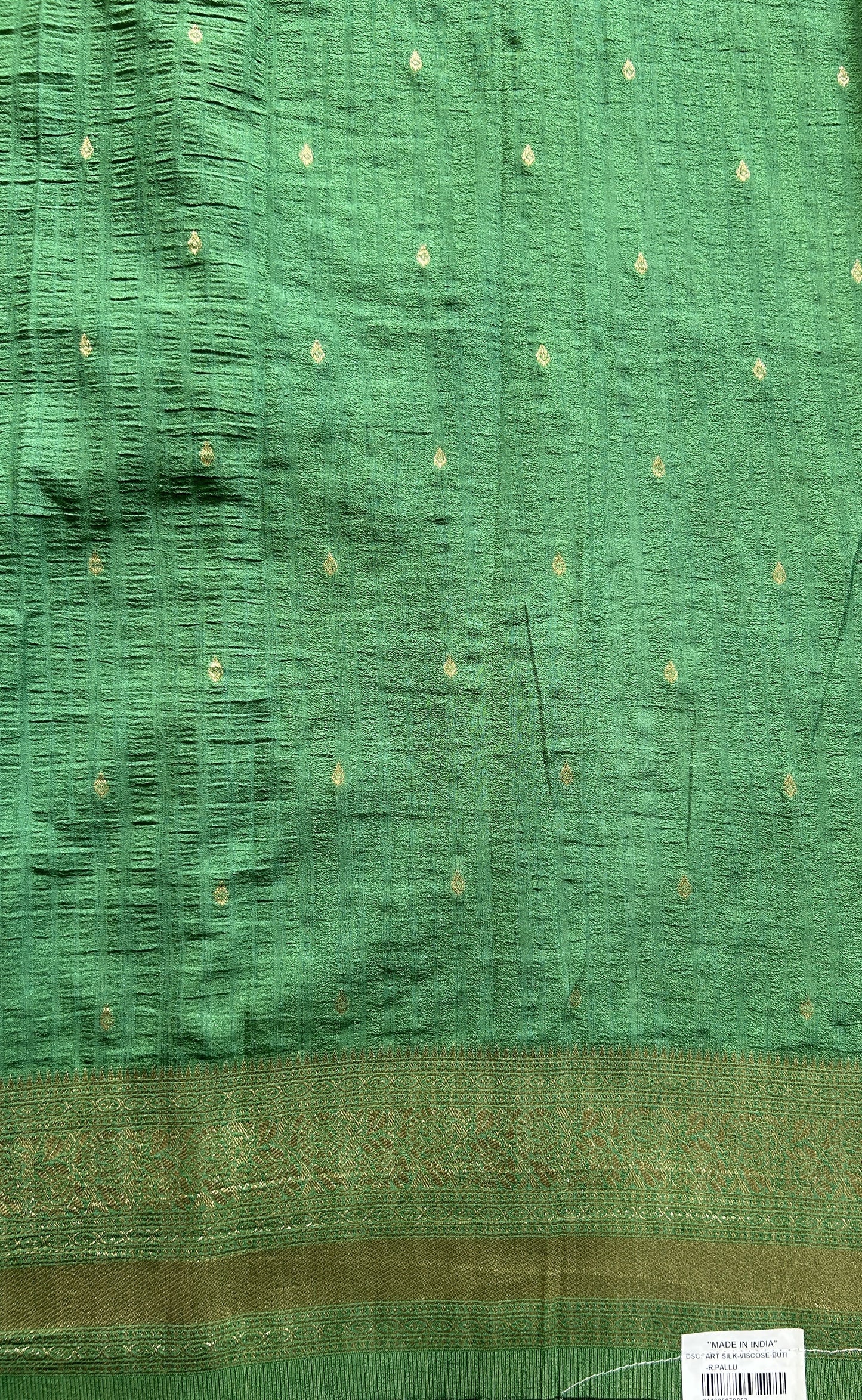 Semi Georgette Saree Green Colored Complemented with a Zari Border. - Sampradaya Designer Studio