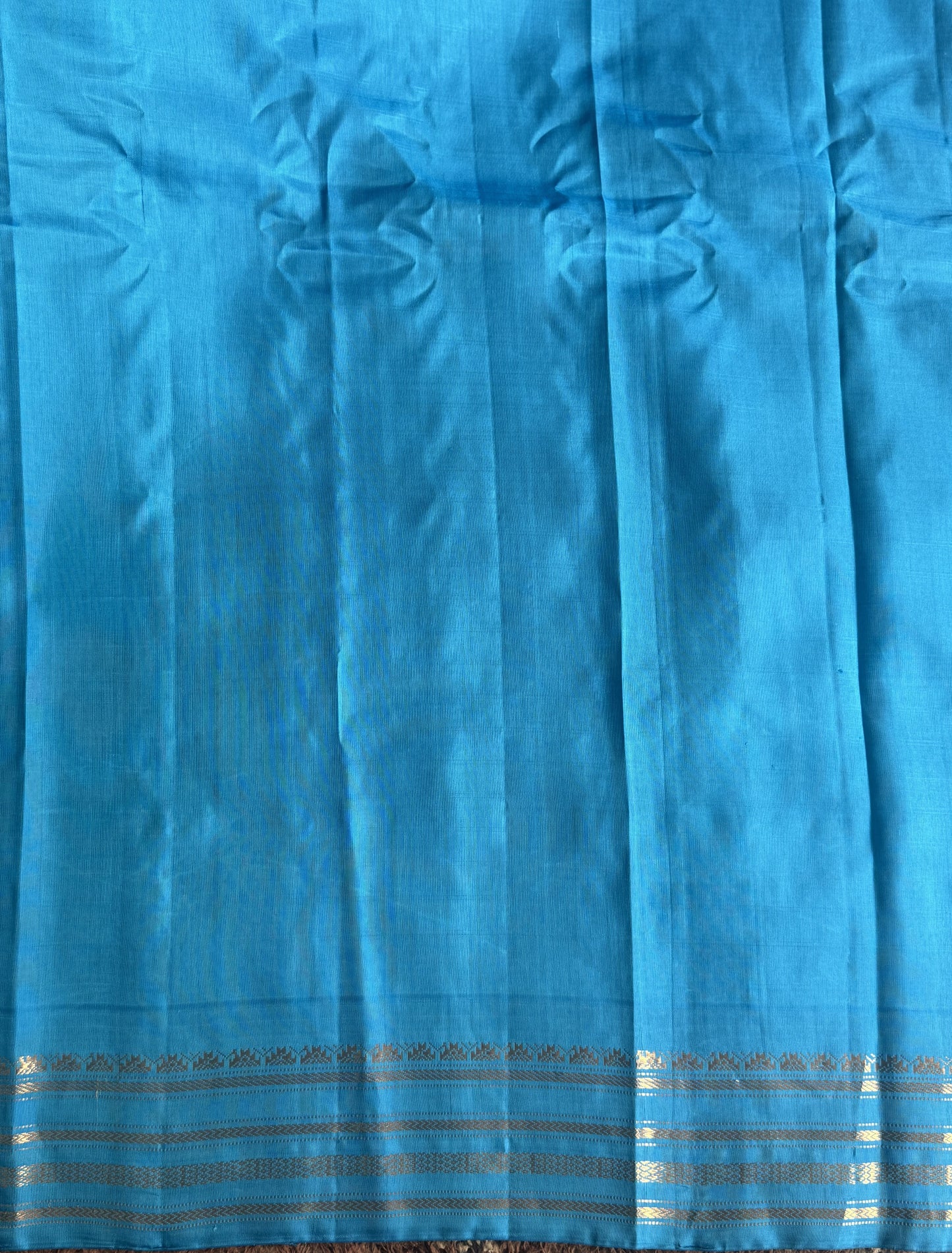 Gadwal Silk Saree Macaroon Colored Complemented With a Blue Zari Border - Sampradaya Designer Studio