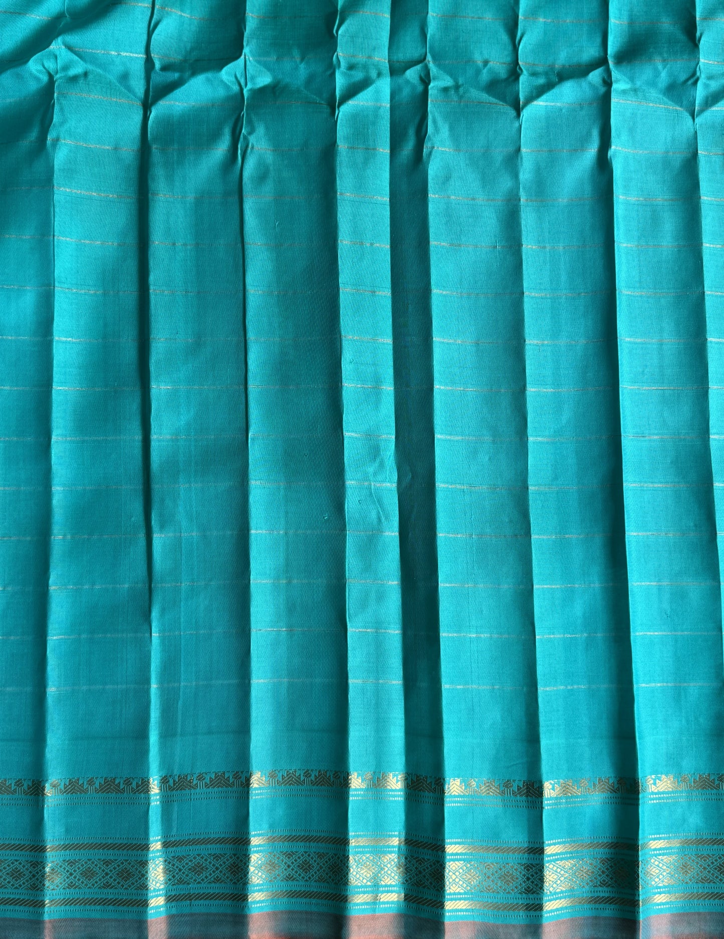 Gadwal Silk Saree Lilac Colored Complemented With a Sea Green Zari Border - Sampradaya Designer Studio