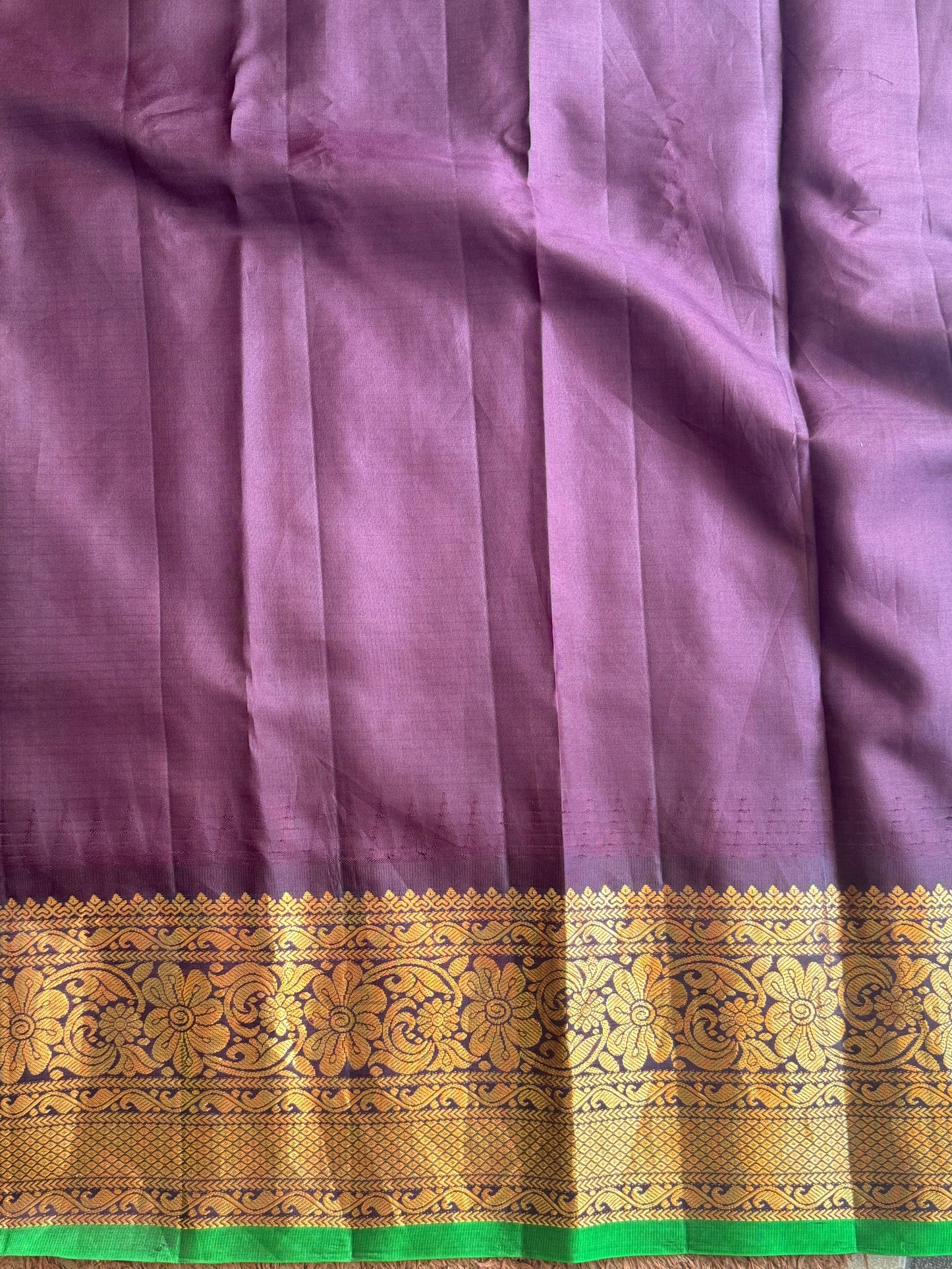 Gadwal Pattu Saree Lavender colored saree complemented with a Brown Zari border - Sampradaya Designer Studio