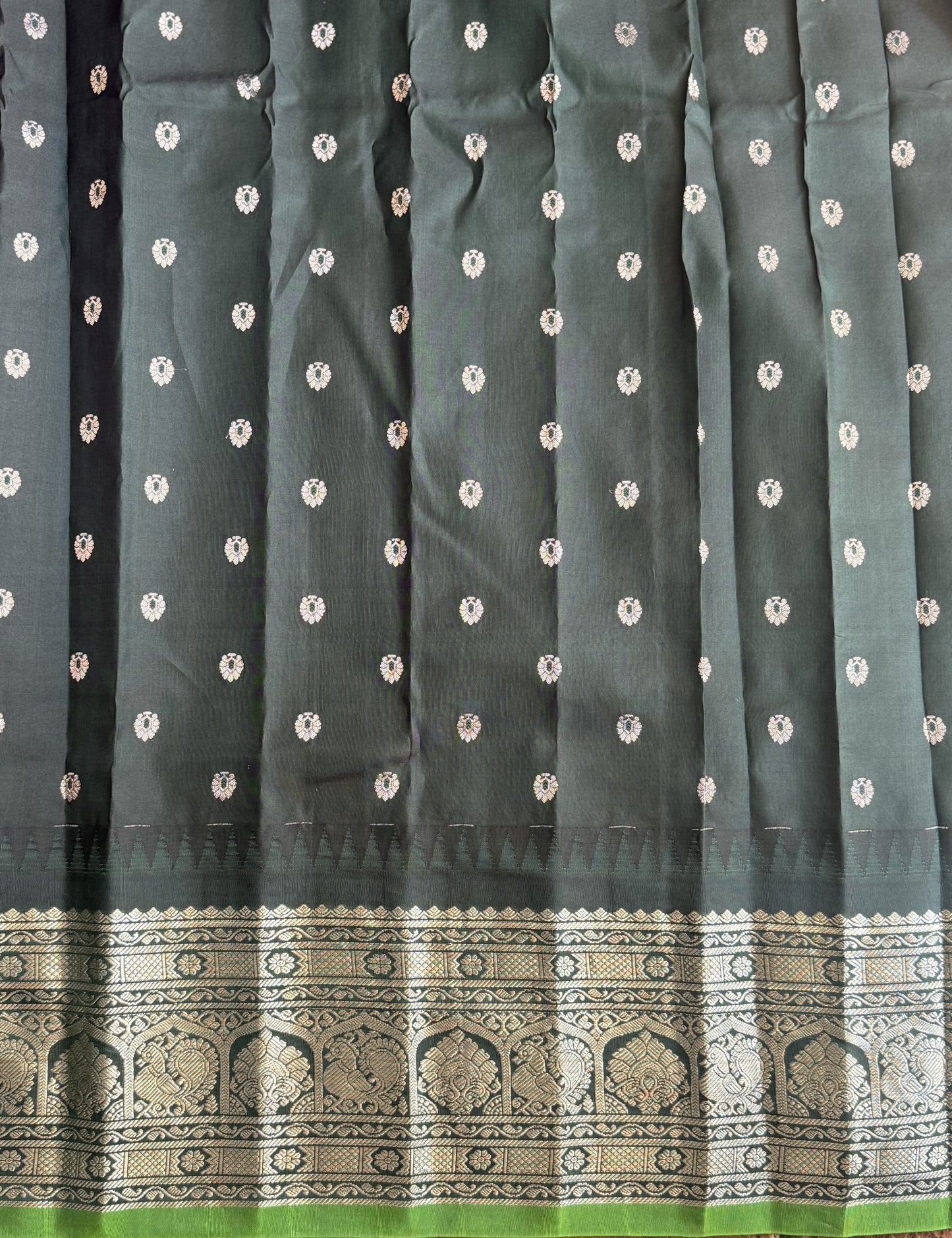 Gadwal Pattu Saree Purple colored saree complemented with a Black Zari border - Sampradaya Designer Studio