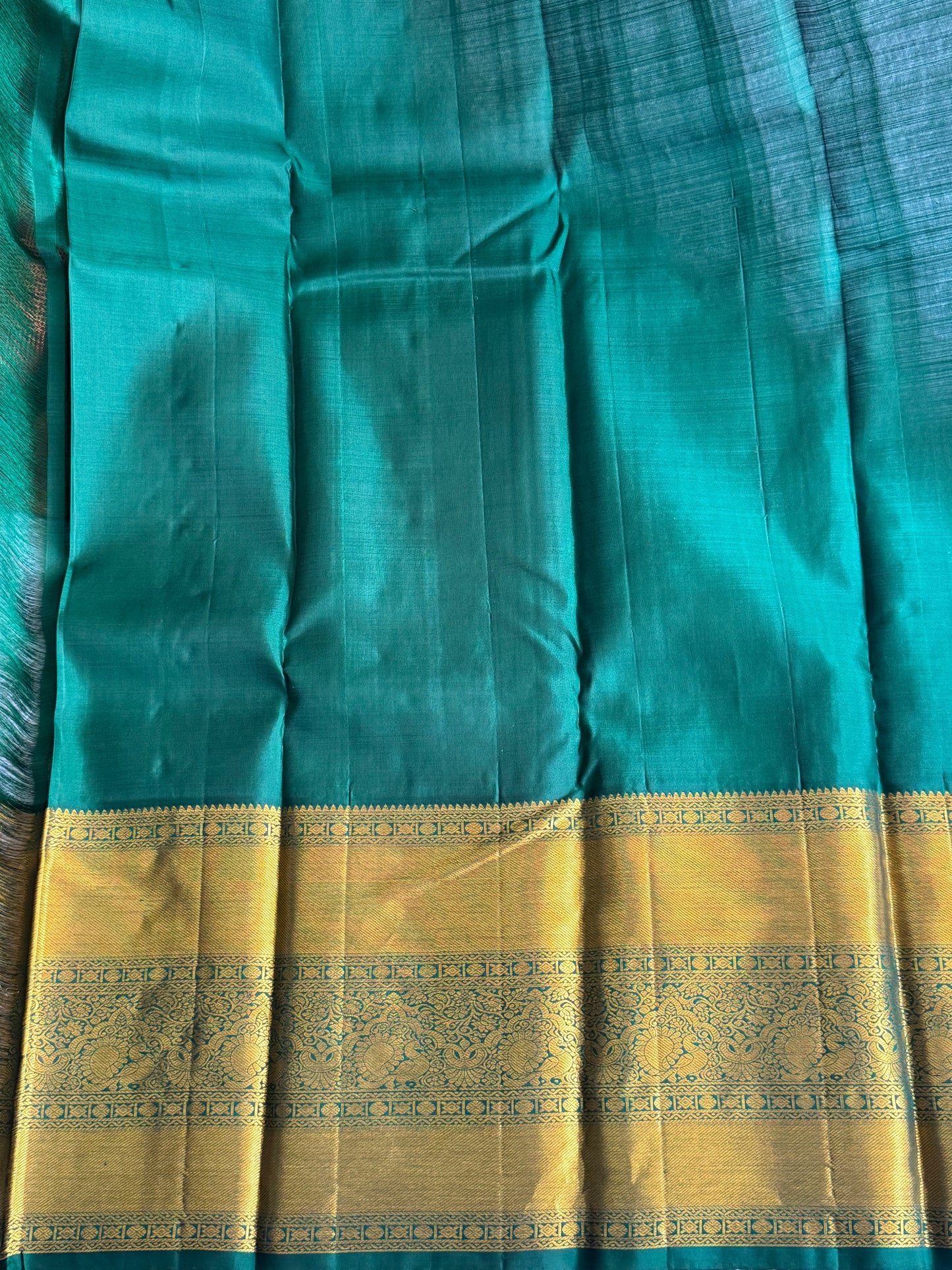 Pure Kanjivaram Silk Saree Dark Red Colored Elegantly Paid with a Gold Zari Border