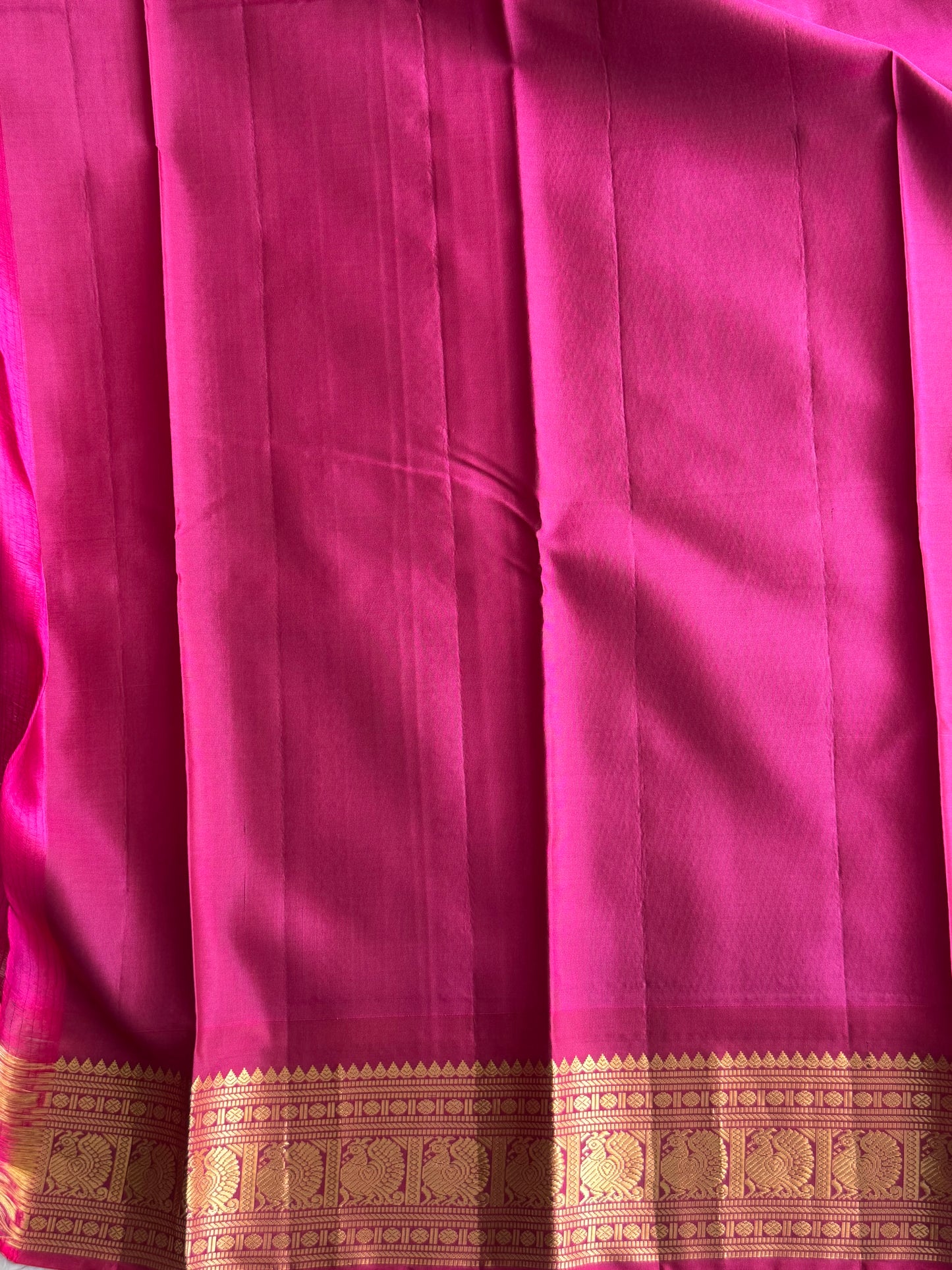 Pure Kanjivaram Silk Saree Light Gray Colored Elegantly Paid with a Gold Zari Border.