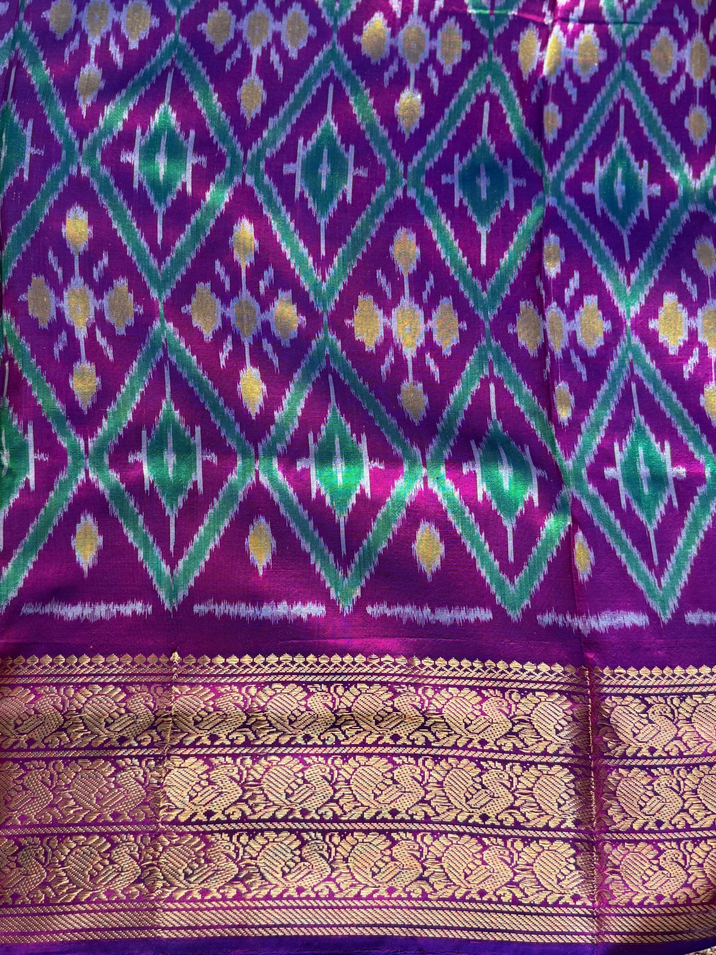 Ikkat Pattu Saree Purple colored complemented with a Violet Kanchi border. - Sampradaya Designer Studio