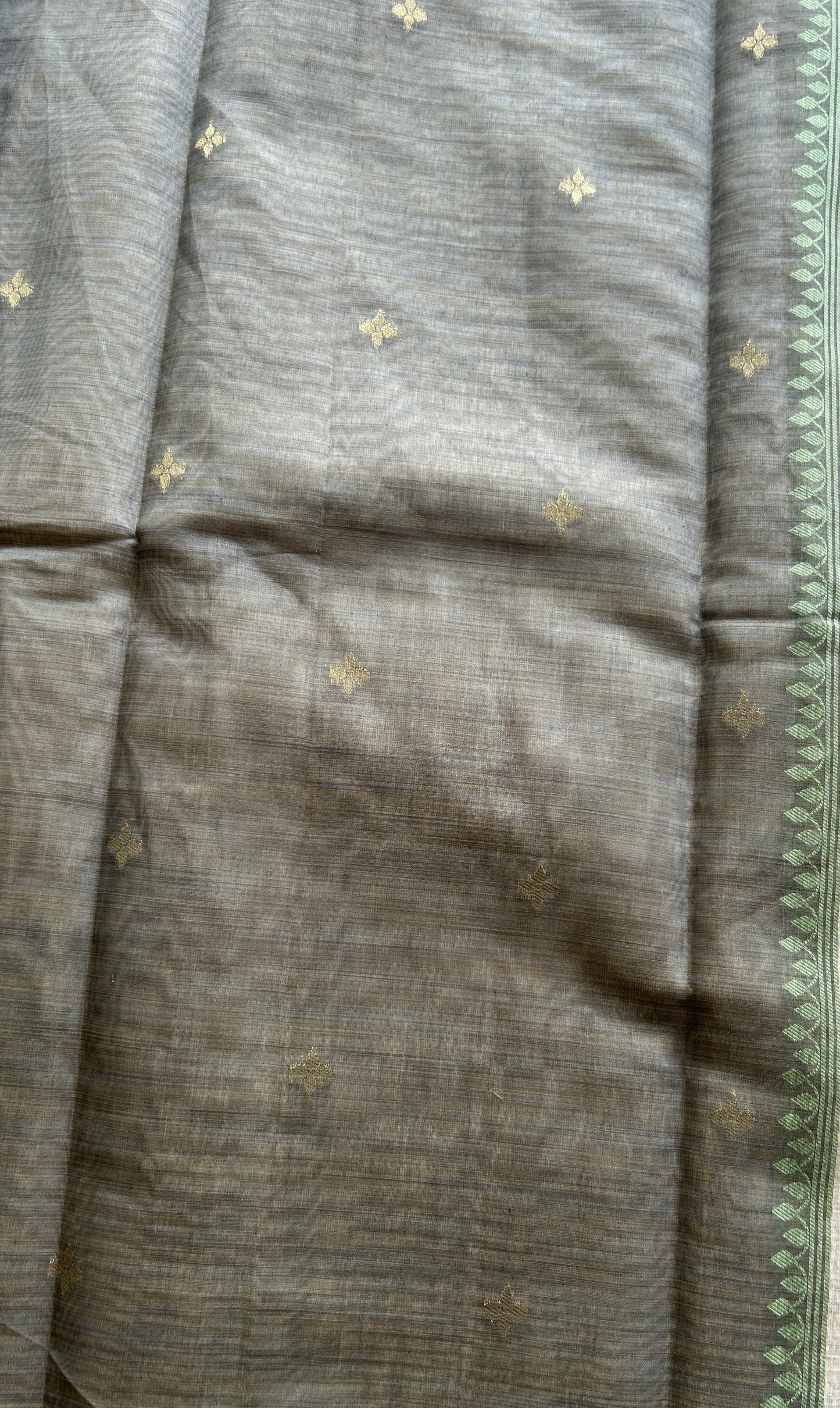 Semi Tussar Saree Colored Bright Cream Complemented with a Borderless. - Sampradaya Designer Studio