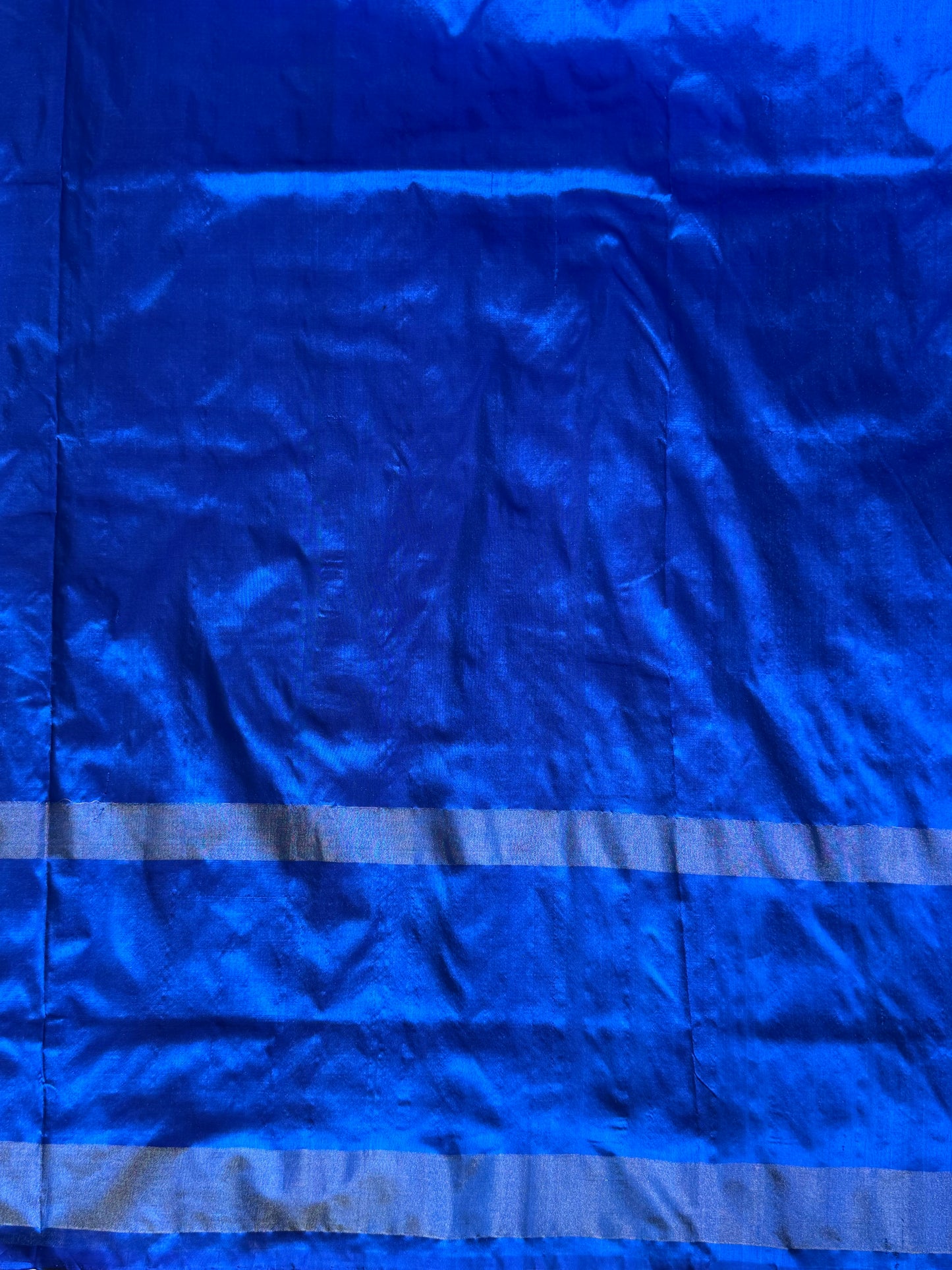 Ikkat Pattu Saree Green colored complemented with a Ikkat Zari border. - Sampradaya Designer Studio