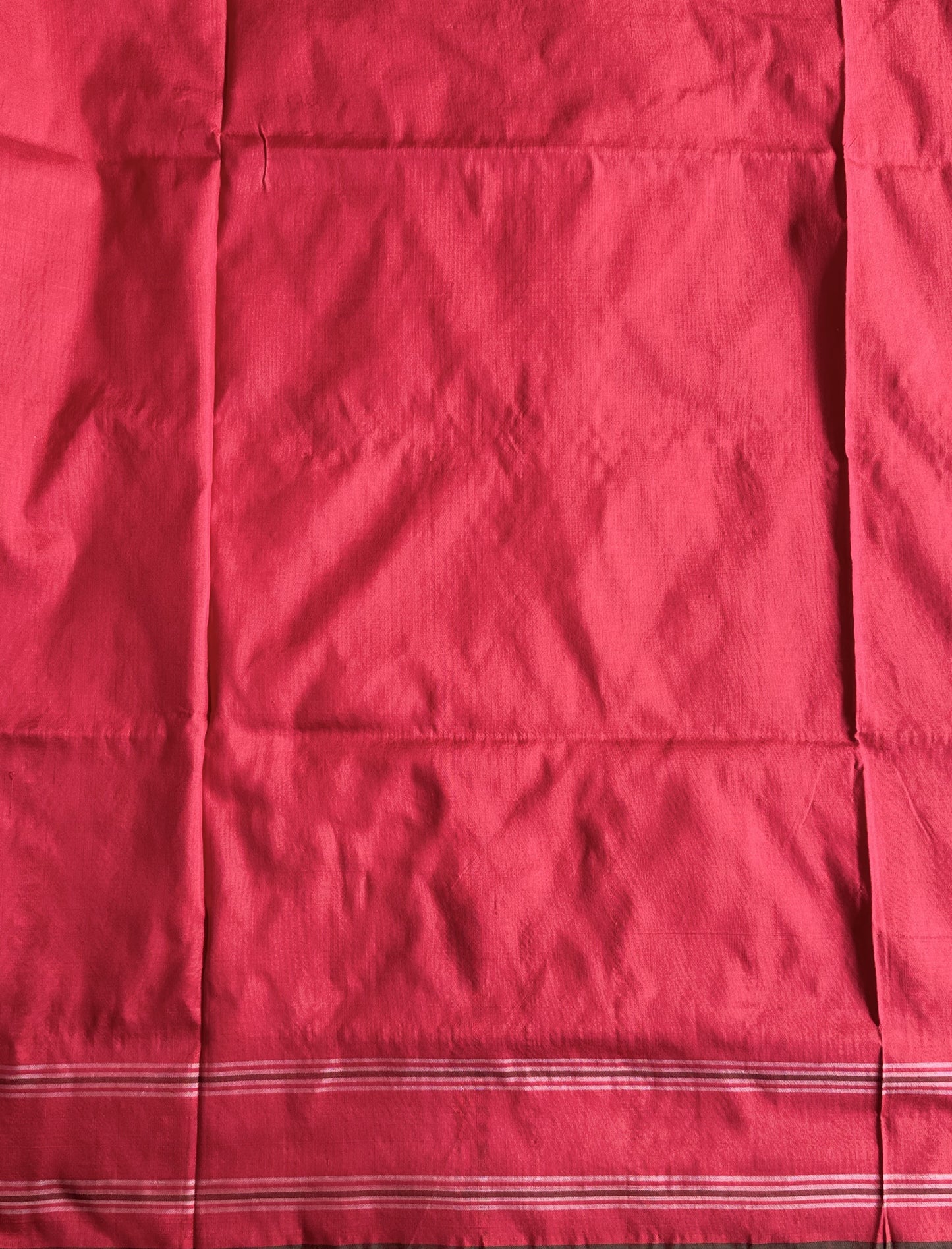 Ikkat Pattu Saree Onion Pink colored complemented with a Patola border. - Sampradaya Designer Studio