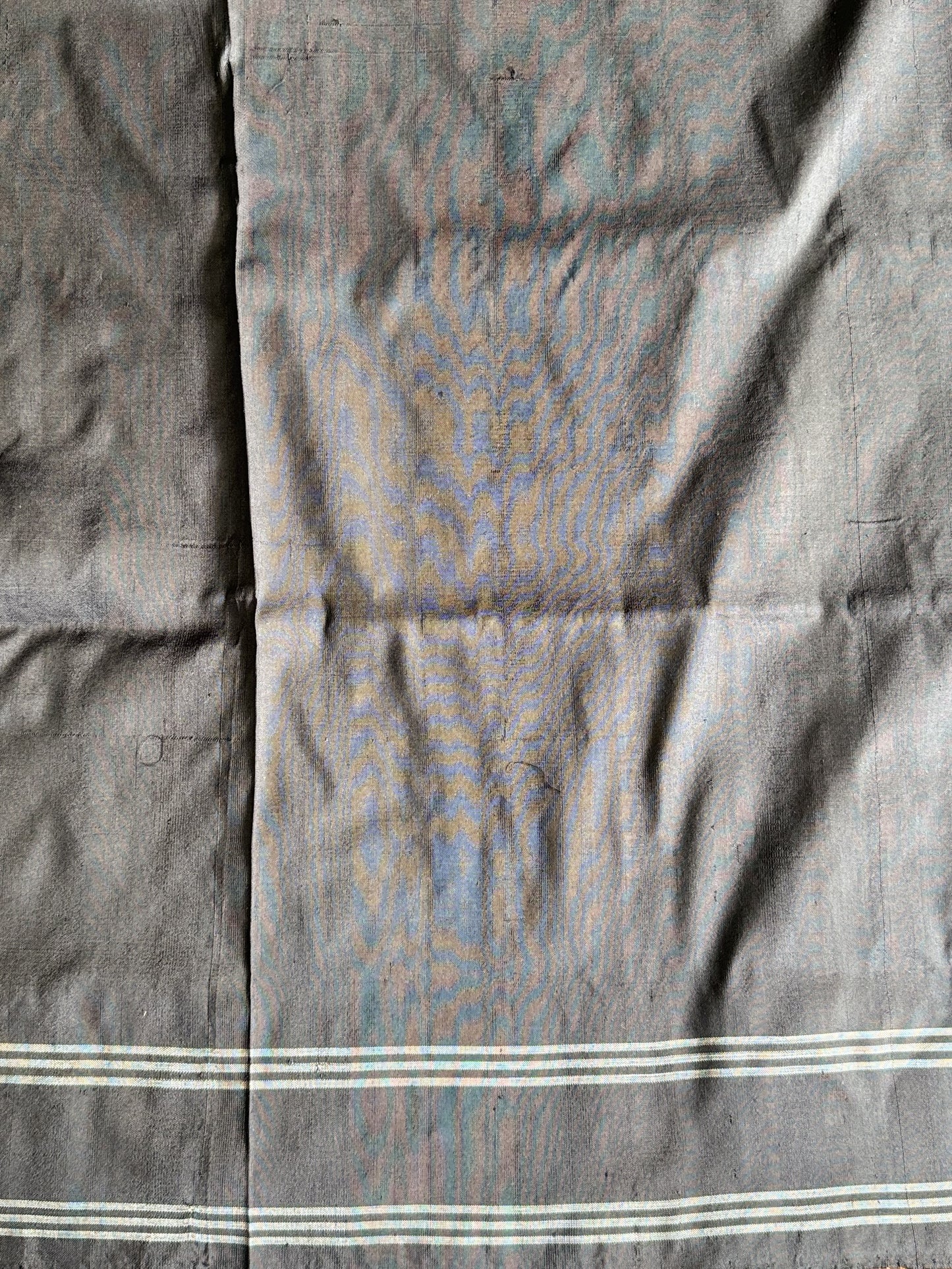 Ikkat Pattu Saree Charcoal colored complemented with a Patola border. - Sampradaya Designer Studio