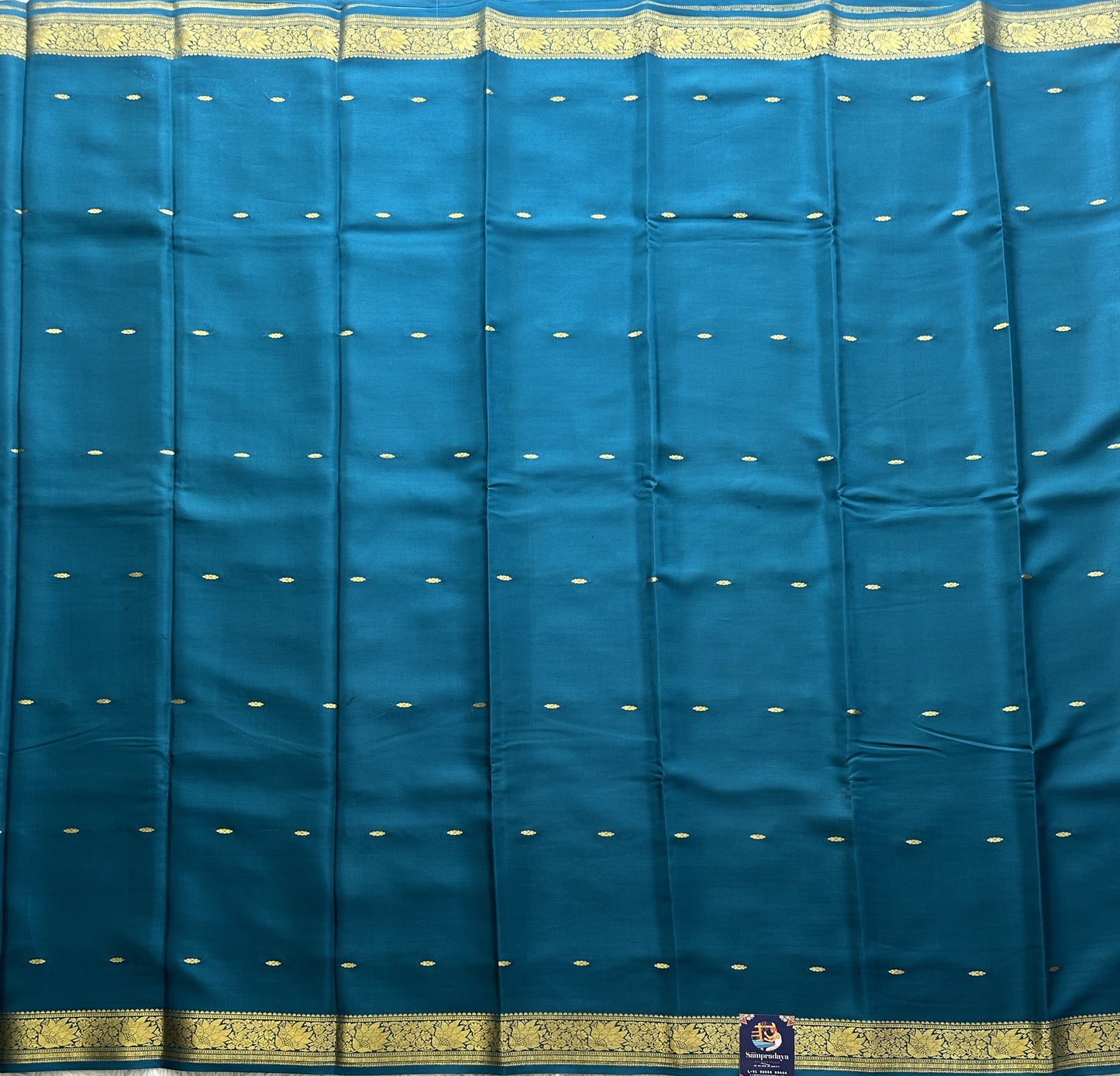 Peacock Blue Mysore Crepe Silk Saree with Silver Zari Border | Pure Handloom | Silk Mark Certified - Sampradaya Designer Studio