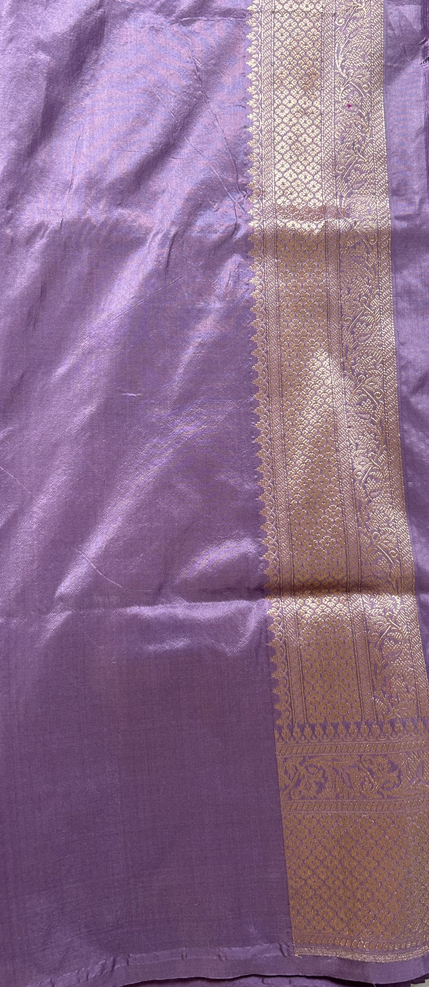 Banarasi Katan Silk Saree Lavender Colored Complemented with a Gold Zari border. - Sampradaya Designer Studio
