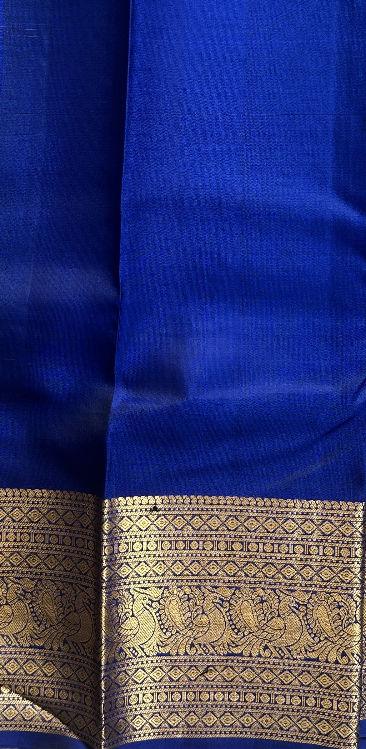 Pure Kanjivaram Silk Saree Royal Blue Colored Complemented with a Gold Zari Border. - Sampradaya Designer Studio