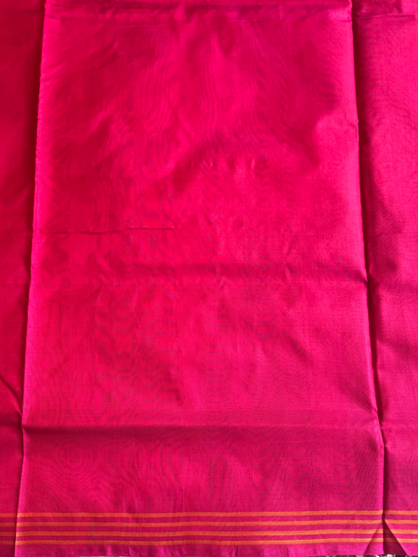 Ikkat Pattu Saree Violet colored complemented with a Pink Ikkat border. - Sampradaya Designer Studio