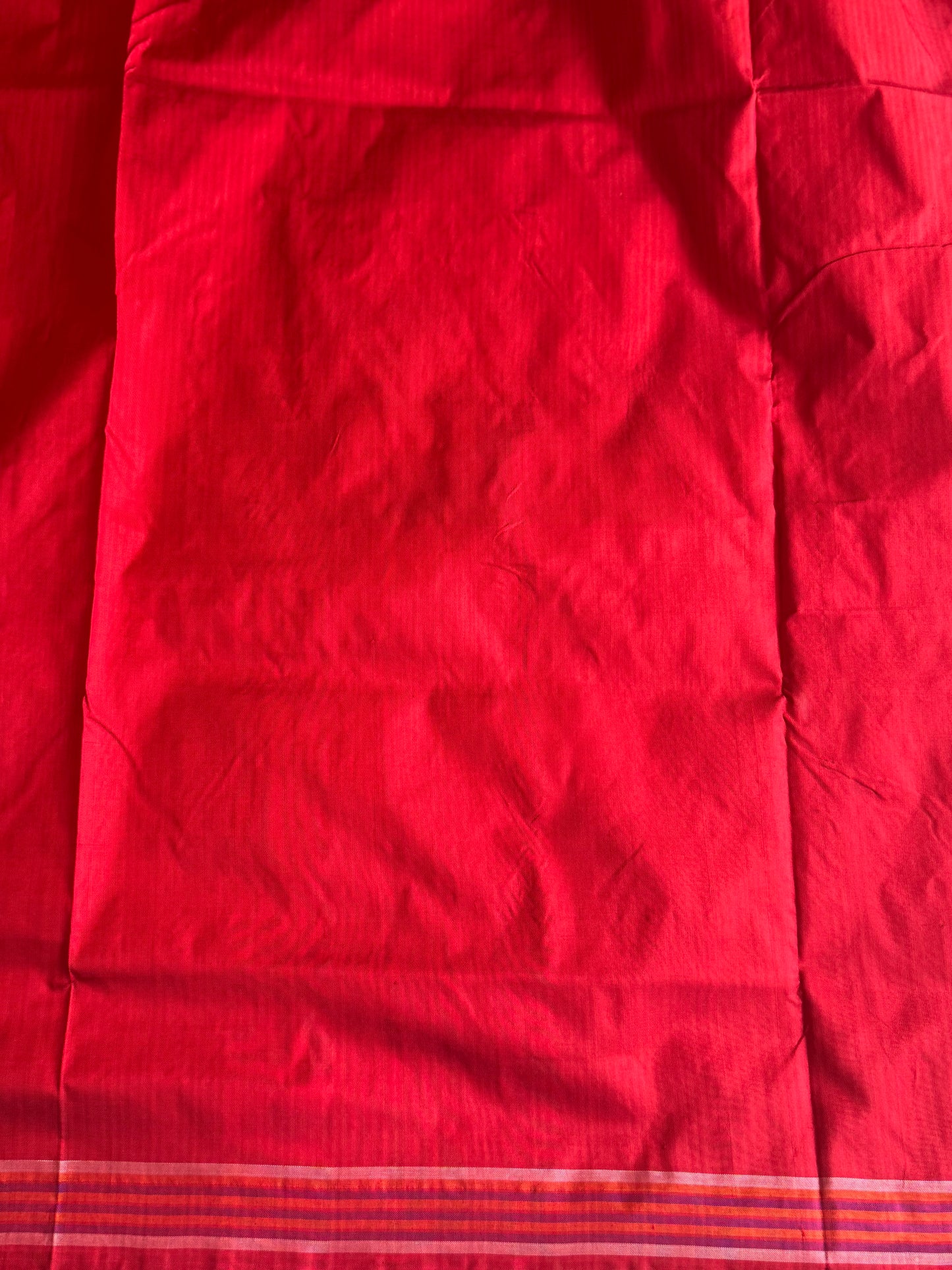 Ikkat Pattu Saree Violet colored complemented with a Red Patolla border. - Sampradaya Designer Studio