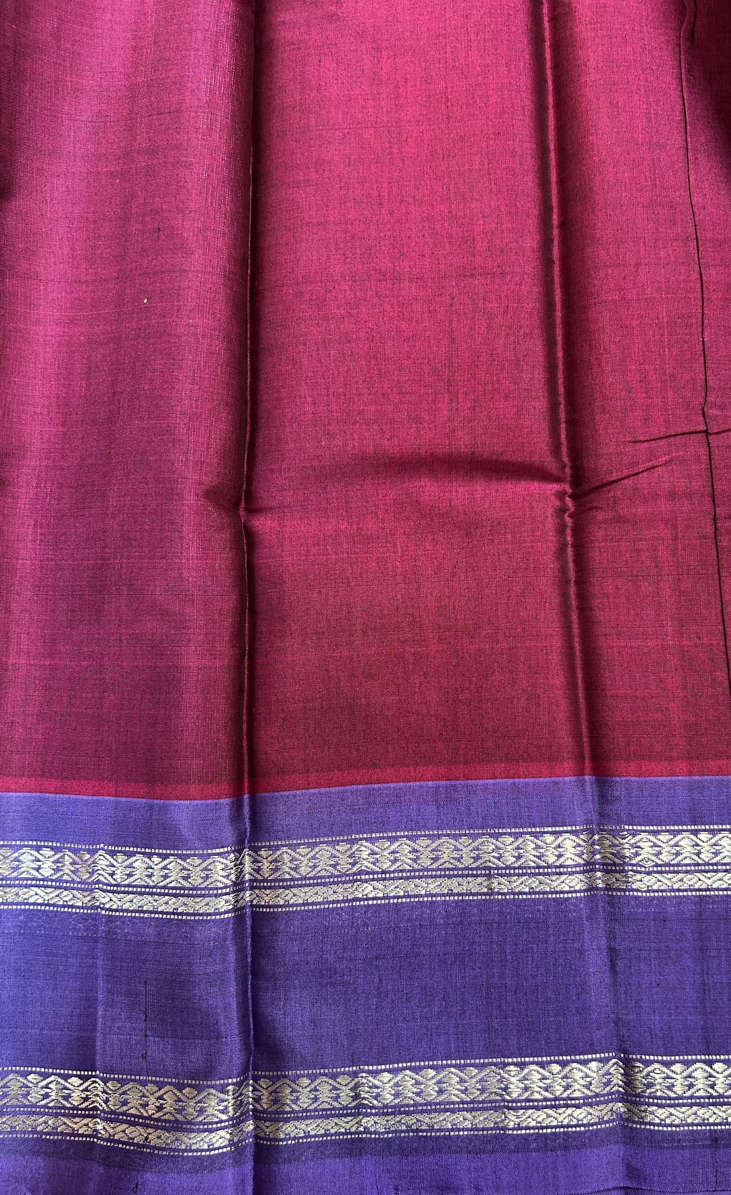 Gadwal Sico Saree Wine colored complemented with a Ink Blue Kanchi Gap Border. - Sampradaya Designer Studio
