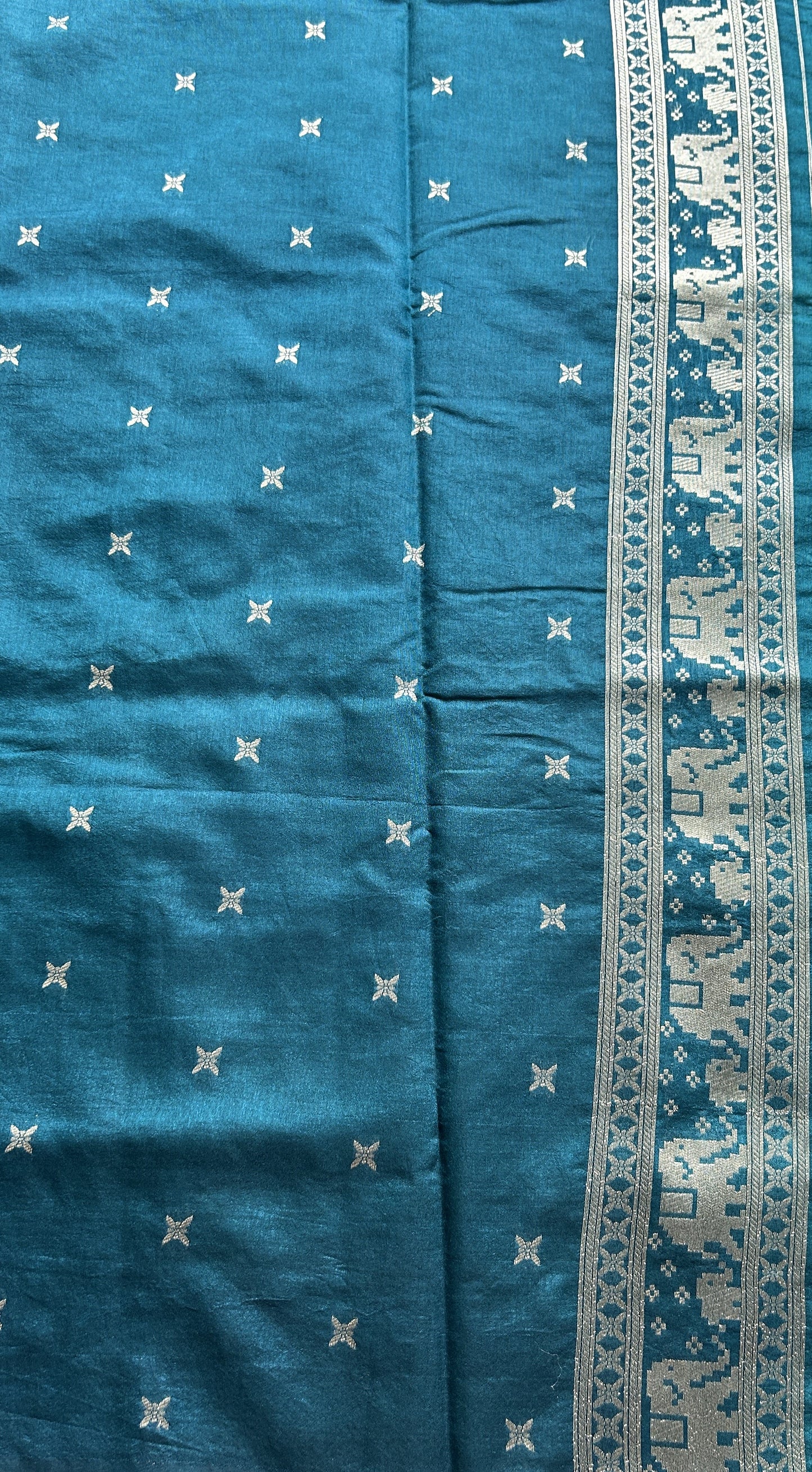 Semi Raw Silk Allover Saree Deep Dusty Blue Colored Complemented with a Zari Border. - Sampradaya Designer Studio