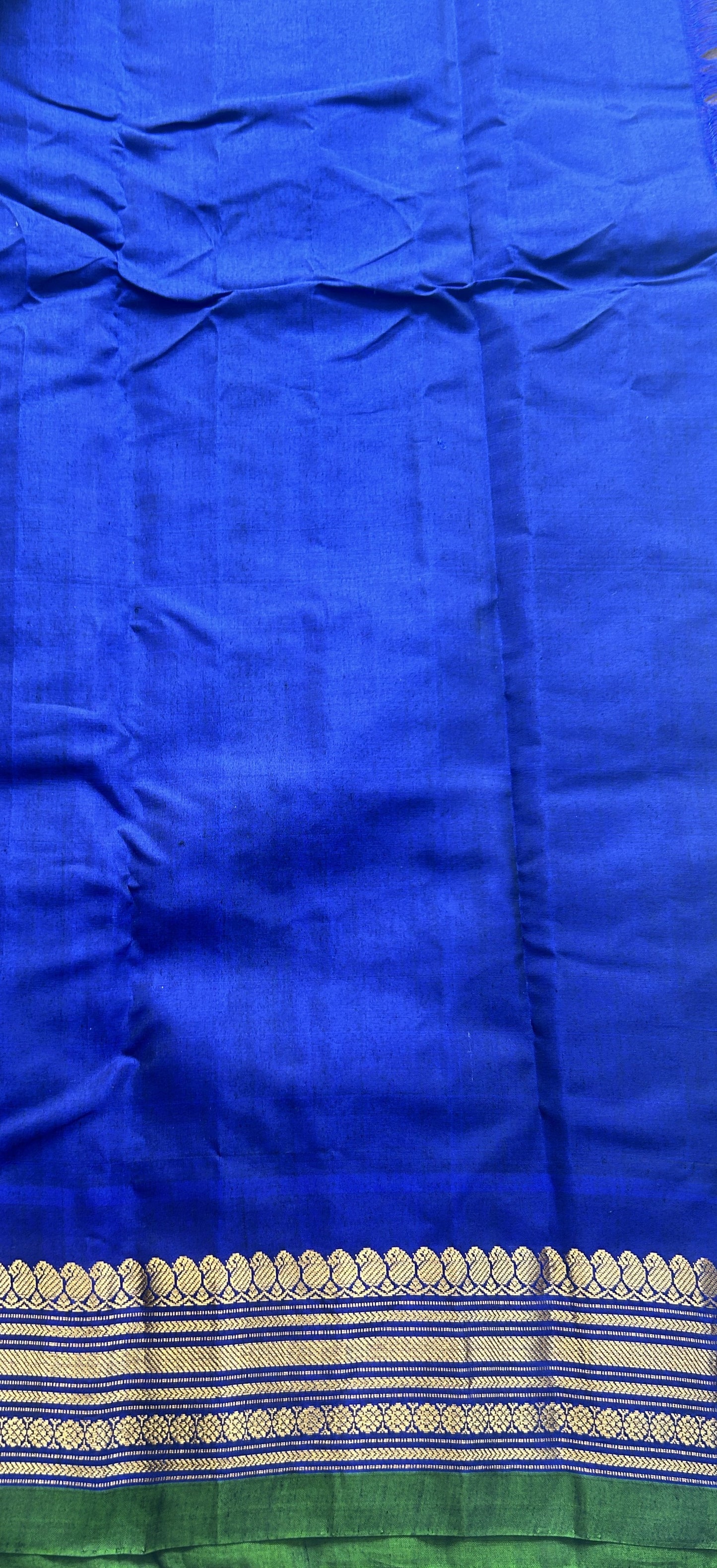 Gadwal Sico Saree Brown colored complemented with a Blue Zari Border. - Sampradaya Designer Studio