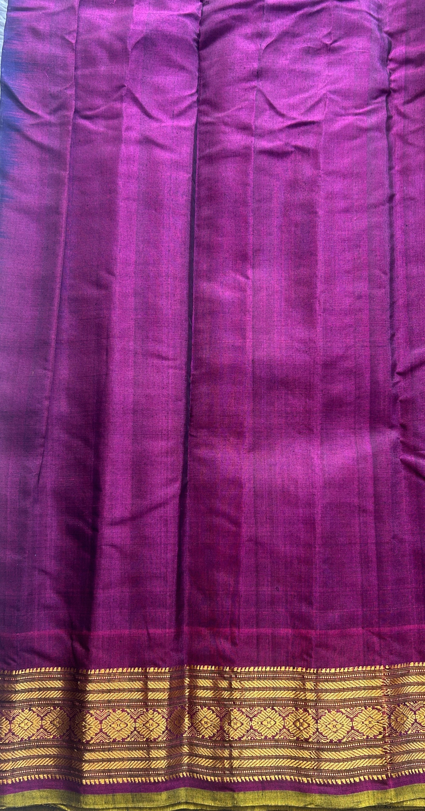 Gadwal Sico Saree Ink Blue colored complemented with a Purple Zari Border. - Sampradaya Designer Studio