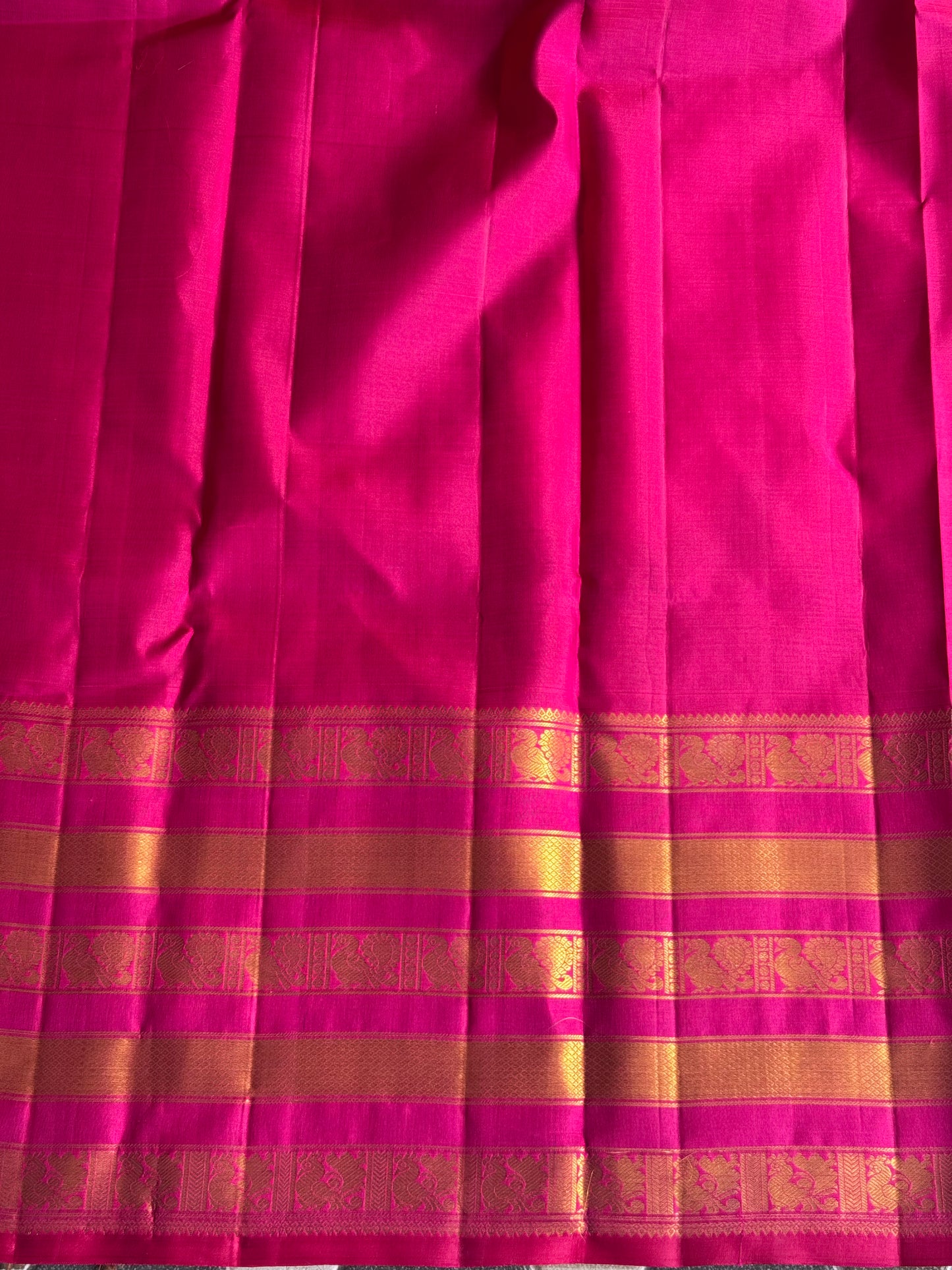 Pure Kanjivaram Silk Saree Dark Pink Colored Complemented with a Gold Zari Border. - Sampradaya Designer Studio