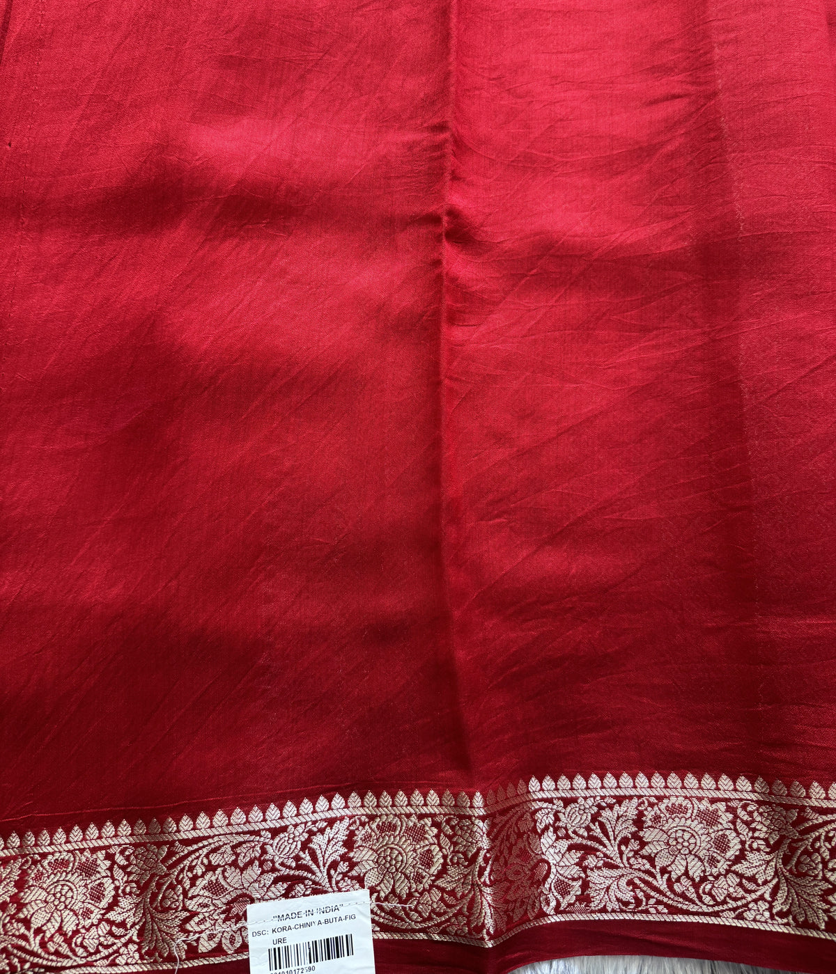 Pure Chiniya Silk Saree Red Colored Elegantly Paired with a Gold Zari Border.