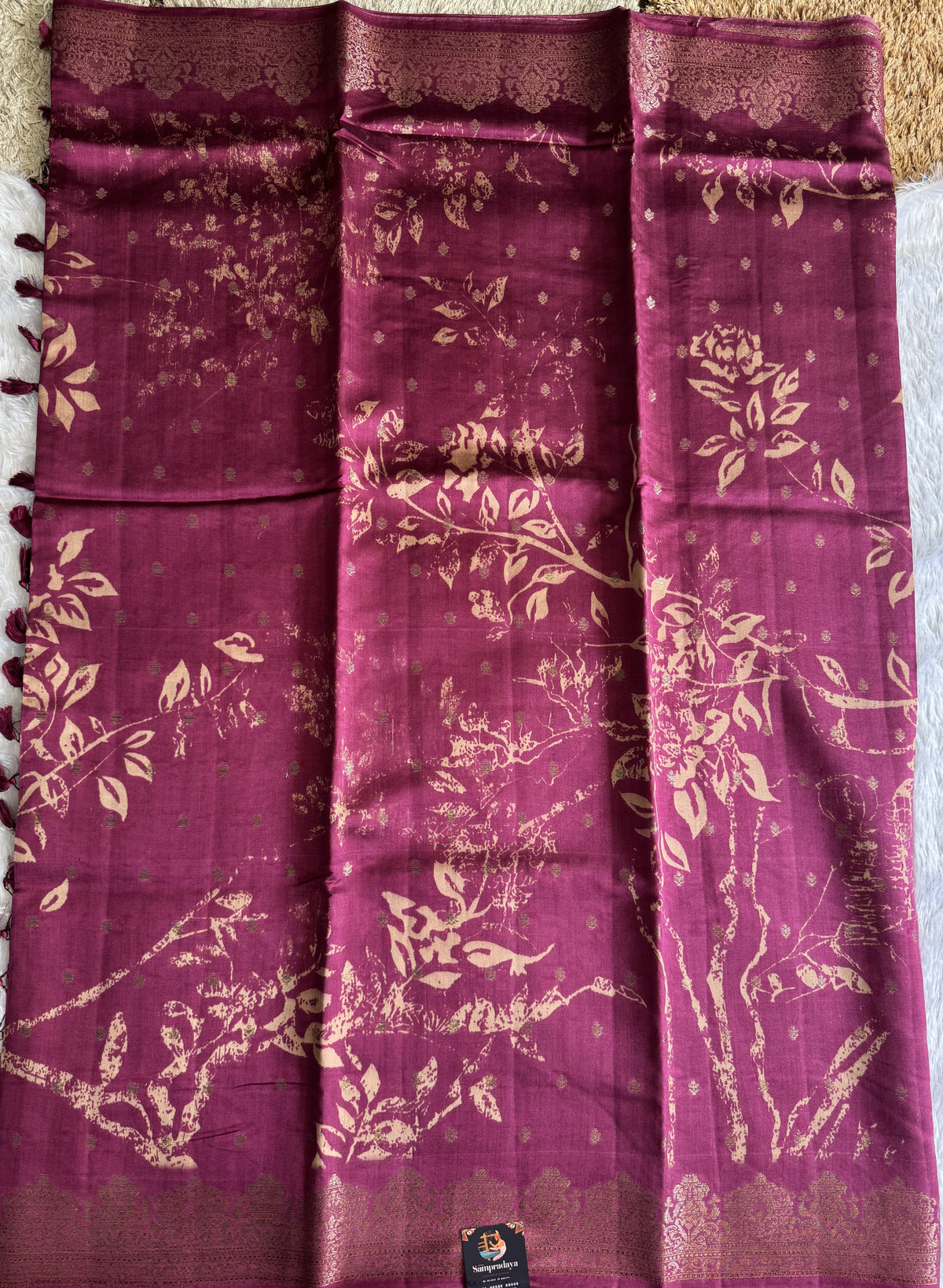 Pure Chiniya Silk Saree Purple Colored Elegantly Paired with a Gold Zari Border.