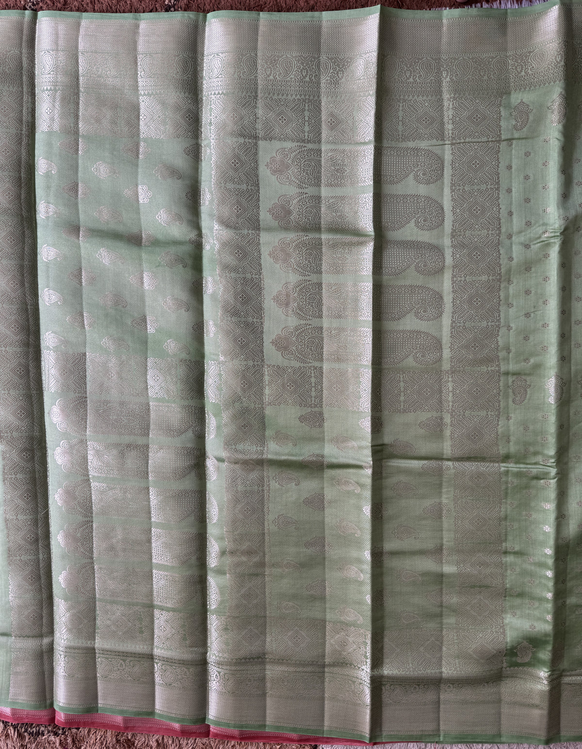 Pure Chiniya Silk Saree Sea Green Colored Elegantly Paired with a Gold Zari Border.