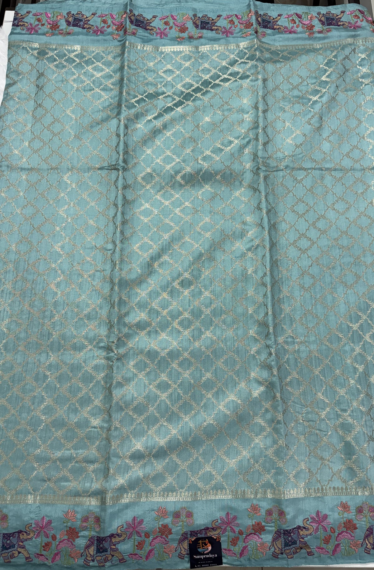 Pure Chiniya Silk Saree Sea Green Colored Elegantly Paired with a Gold Zari Border